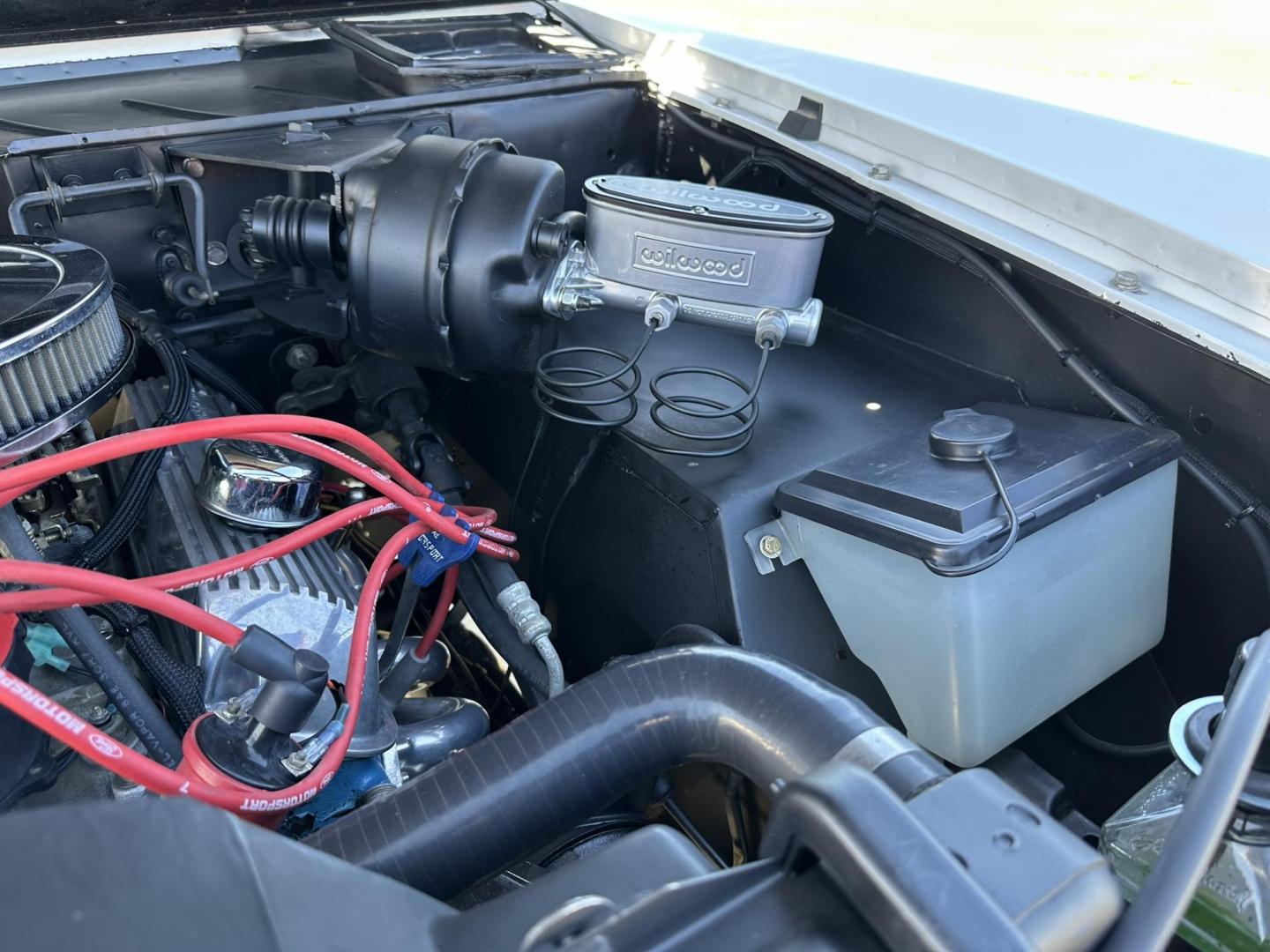 1971 White /Black / Grey Ford Bronco (U15GLK86693) with an 302 engine, np 435 4 speed transmission, located at 2630 Grass Valley Highway, Auburn, CA, 95603, (530) 508-5100, 38.937893, -121.095482 - 1971 FORD BRONCO BUILD CALIFORNIA BRONCO HARD TOP AND NO RUST REBUILT 302 WITH PERFORMANCE CAM, EDELBROCK MANIFOLD, HOLLEY AVENGER 650 CARB & MSD IGNITION NP 435 4 SPEED WITH WILD HORSE BILLET SHIFT EXTENDER DANA 20 WITH WILD HORSE TWIN STICK TRANSFER CASE NEW PAINLESS WIRING HARNESS RHINO LIN - Photo#81