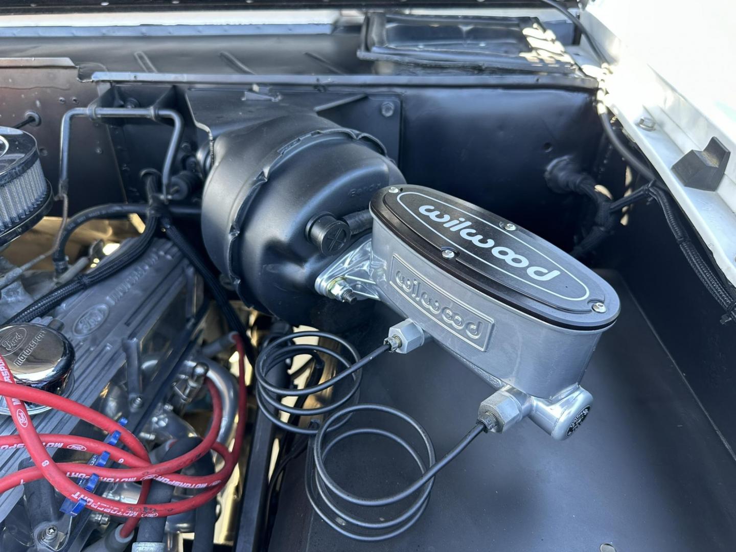 1971 White /Black / Grey Ford Bronco (U15GLK86693) with an 302 engine, np 435 4 speed transmission, located at 2630 Grass Valley Highway, Auburn, CA, 95603, (530) 508-5100, 38.937893, -121.095482 - 1971 FORD BRONCO BUILD CALIFORNIA BRONCO HARD TOP AND NO RUST REBUILT 302 WITH PERFORMANCE CAM, EDELBROCK MANIFOLD, HOLLEY AVENGER 650 CARB & MSD IGNITION NP 435 4 SPEED WITH WILD HORSE BILLET SHIFT EXTENDER DANA 20 WITH WILD HORSE TWIN STICK TRANSFER CASE NEW PAINLESS WIRING HARNESS RHINO LIN - Photo#83
