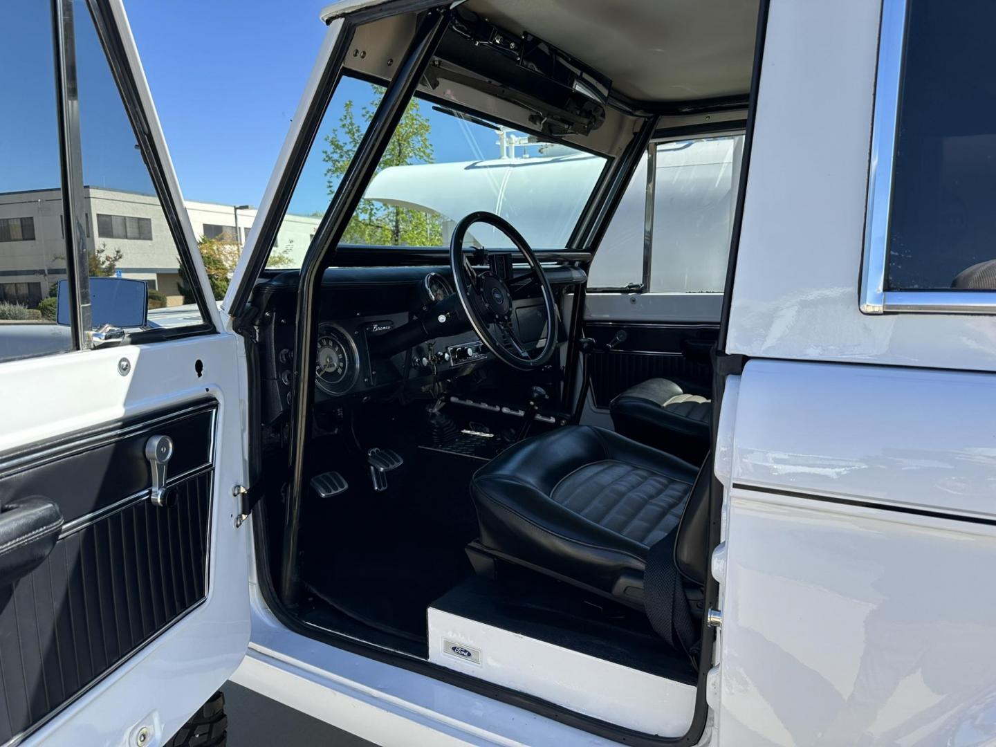 1971 White /Black / Grey Ford Bronco (U15GLK86693) with an 302 engine, np 435 4 speed transmission, located at 2630 Grass Valley Highway, Auburn, CA, 95603, (530) 508-5100, 38.937893, -121.095482 - 1971 FORD BRONCO BUILD CALIFORNIA BRONCO HARD TOP AND NO RUST REBUILT 302 WITH PERFORMANCE CAM, EDELBROCK MANIFOLD, HOLLEY AVENGER 650 CARB & MSD IGNITION NP 435 4 SPEED WITH WILD HORSE BILLET SHIFT EXTENDER DANA 20 WITH WILD HORSE TWIN STICK TRANSFER CASE NEW PAINLESS WIRING HARNESS RHINO LIN - Photo#88