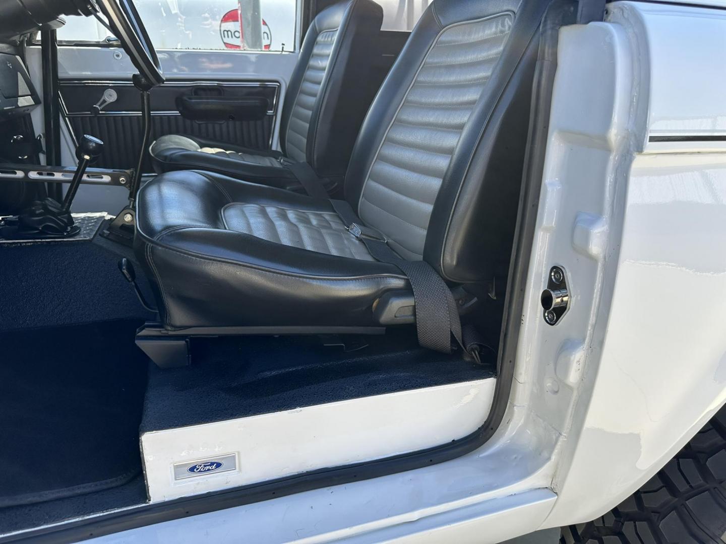 1971 White /Black / Grey Ford Bronco (U15GLK86693) with an 302 engine, np 435 4 speed transmission, located at 2630 Grass Valley Highway, Auburn, CA, 95603, (530) 508-5100, 38.937893, -121.095482 - 1971 FORD BRONCO BUILD CALIFORNIA BRONCO HARD TOP AND NO RUST REBUILT 302 WITH PERFORMANCE CAM, EDELBROCK MANIFOLD, HOLLEY AVENGER 650 CARB & MSD IGNITION NP 435 4 SPEED WITH WILD HORSE BILLET SHIFT EXTENDER DANA 20 WITH WILD HORSE TWIN STICK TRANSFER CASE NEW PAINLESS WIRING HARNESS RHINO LIN - Photo#91