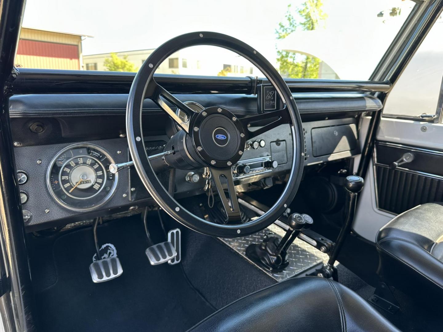 1971 White /Black / Grey Ford Bronco (U15GLK86693) with an 302 engine, np 435 4 speed transmission, located at 2630 Grass Valley Highway, Auburn, CA, 95603, (530) 508-5100, 38.937893, -121.095482 - 1971 FORD BRONCO BUILD CALIFORNIA BRONCO HARD TOP AND NO RUST REBUILT 302 WITH PERFORMANCE CAM, EDELBROCK MANIFOLD, HOLLEY AVENGER 650 CARB & MSD IGNITION NP 435 4 SPEED WITH WILD HORSE BILLET SHIFT EXTENDER DANA 20 WITH WILD HORSE TWIN STICK TRANSFER CASE NEW PAINLESS WIRING HARNESS RHINO LIN - Photo#95