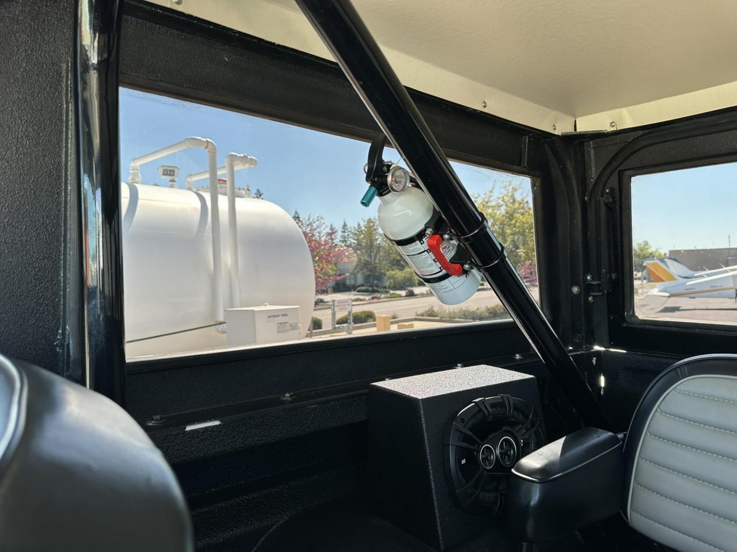 1971 White /Black / Grey Ford Bronco (U15GLK86693) with an 302 engine, np 435 4 speed transmission, located at 2630 Grass Valley Highway, Auburn, CA, 95603, (530) 508-5100, 38.937893, -121.095482 - 1971 FORD BRONCO BUILD CALIFORNIA BRONCO HARD TOP AND NO RUST REBUILT 302 WITH PERFORMANCE CAM, EDELBROCK MANIFOLD, HOLLEY AVENGER 650 CARB & MSD IGNITION NP 435 4 SPEED WITH WILD HORSE BILLET SHIFT EXTENDER DANA 20 WITH WILD HORSE TWIN STICK TRANSFER CASE NEW PAINLESS WIRING HARNESS RHINO LIN - Photo#102
