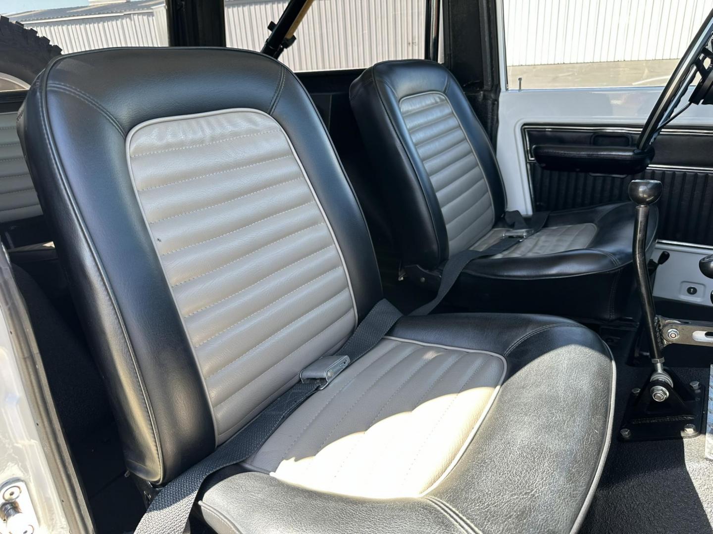 1971 White /Black / Grey Ford Bronco (U15GLK86693) with an 302 engine, np 435 4 speed transmission, located at 2630 Grass Valley Highway, Auburn, CA, 95603, (530) 508-5100, 38.937893, -121.095482 - 1971 FORD BRONCO BUILD CALIFORNIA BRONCO HARD TOP AND NO RUST REBUILT 302 WITH PERFORMANCE CAM, EDELBROCK MANIFOLD, HOLLEY AVENGER 650 CARB & MSD IGNITION NP 435 4 SPEED WITH WILD HORSE BILLET SHIFT EXTENDER DANA 20 WITH WILD HORSE TWIN STICK TRANSFER CASE NEW PAINLESS WIRING HARNESS RHINO LIN - Photo#115