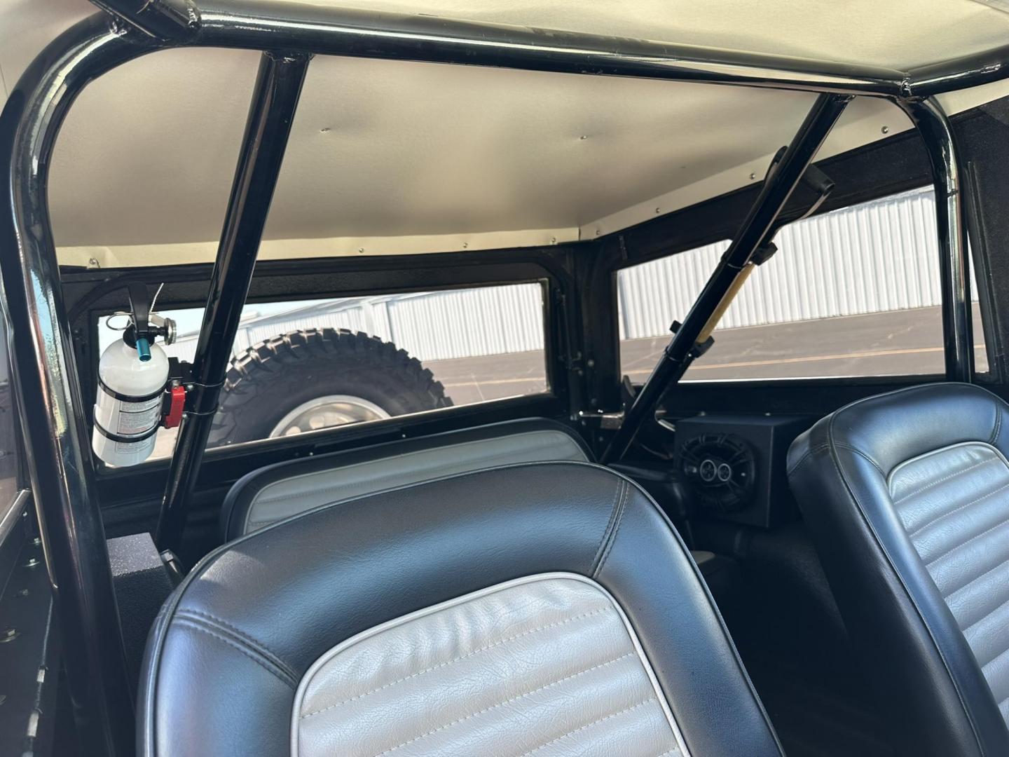 1971 White /Black / Grey Ford Bronco (U15GLK86693) with an 302 engine, np 435 4 speed transmission, located at 2630 Grass Valley Highway, Auburn, CA, 95603, (530) 508-5100, 38.937893, -121.095482 - 1971 FORD BRONCO BUILD CALIFORNIA BRONCO HARD TOP AND NO RUST REBUILT 302 WITH PERFORMANCE CAM, EDELBROCK MANIFOLD, HOLLEY AVENGER 650 CARB & MSD IGNITION NP 435 4 SPEED WITH WILD HORSE BILLET SHIFT EXTENDER DANA 20 WITH WILD HORSE TWIN STICK TRANSFER CASE NEW PAINLESS WIRING HARNESS RHINO LIN - Photo#116