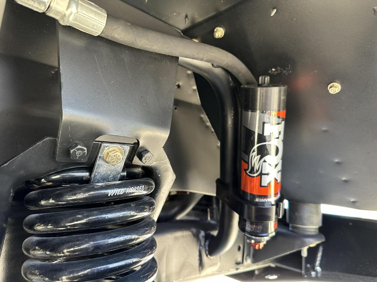 1971 White /Black / Grey Ford Bronco (U15GLK86693) with an 302 engine, np 435 4 speed transmission, located at 2630 Grass Valley Highway, Auburn, CA, 95603, (530) 508-5100, 38.937893, -121.095482 - 1971 FORD BRONCO BUILD CALIFORNIA BRONCO HARD TOP AND NO RUST REBUILT 302 WITH PERFORMANCE CAM, EDELBROCK MANIFOLD, HOLLEY AVENGER 650 CARB & MSD IGNITION NP 435 4 SPEED WITH WILD HORSE BILLET SHIFT EXTENDER DANA 20 WITH WILD HORSE TWIN STICK TRANSFER CASE NEW PAINLESS WIRING HARNESS RHINO LIN - Photo#122