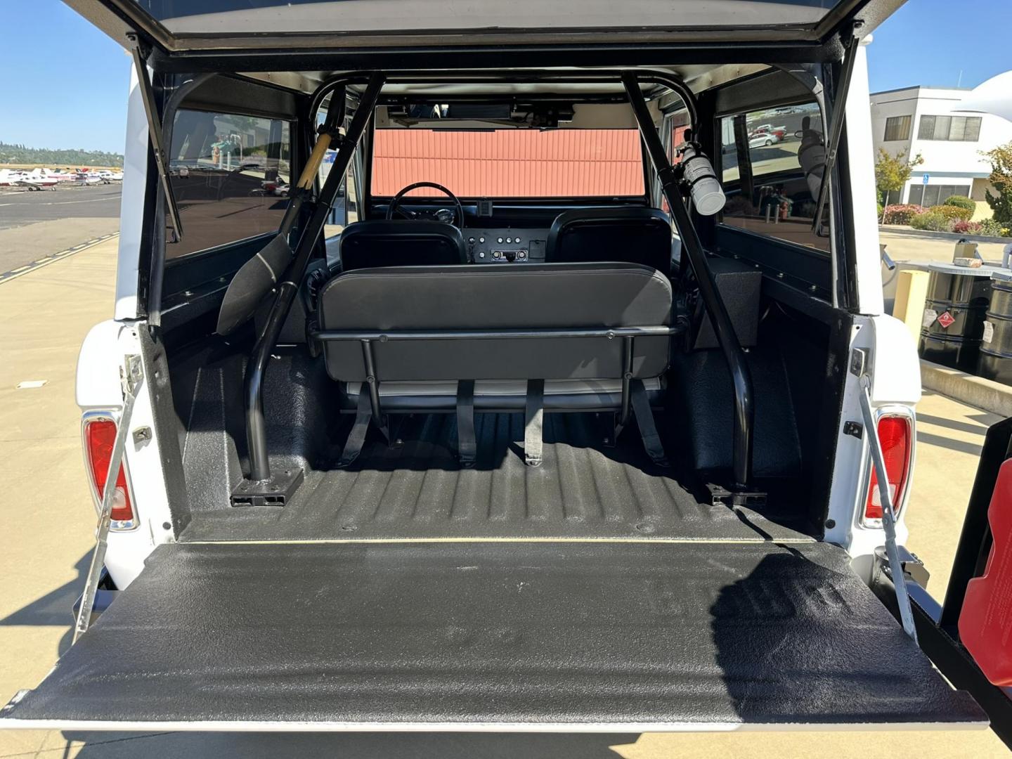 1971 White /Black / Grey Ford Bronco (U15GLK86693) with an 302 engine, np 435 4 speed transmission, located at 2630 Grass Valley Highway, Auburn, CA, 95603, (530) 508-5100, 38.937893, -121.095482 - 1971 FORD BRONCO BUILD CALIFORNIA BRONCO HARD TOP AND NO RUST REBUILT 302 WITH PERFORMANCE CAM, EDELBROCK MANIFOLD, HOLLEY AVENGER 650 CARB & MSD IGNITION NP 435 4 SPEED WITH WILD HORSE BILLET SHIFT EXTENDER DANA 20 WITH WILD HORSE TWIN STICK TRANSFER CASE NEW PAINLESS WIRING HARNESS RHINO LIN - Photo#126