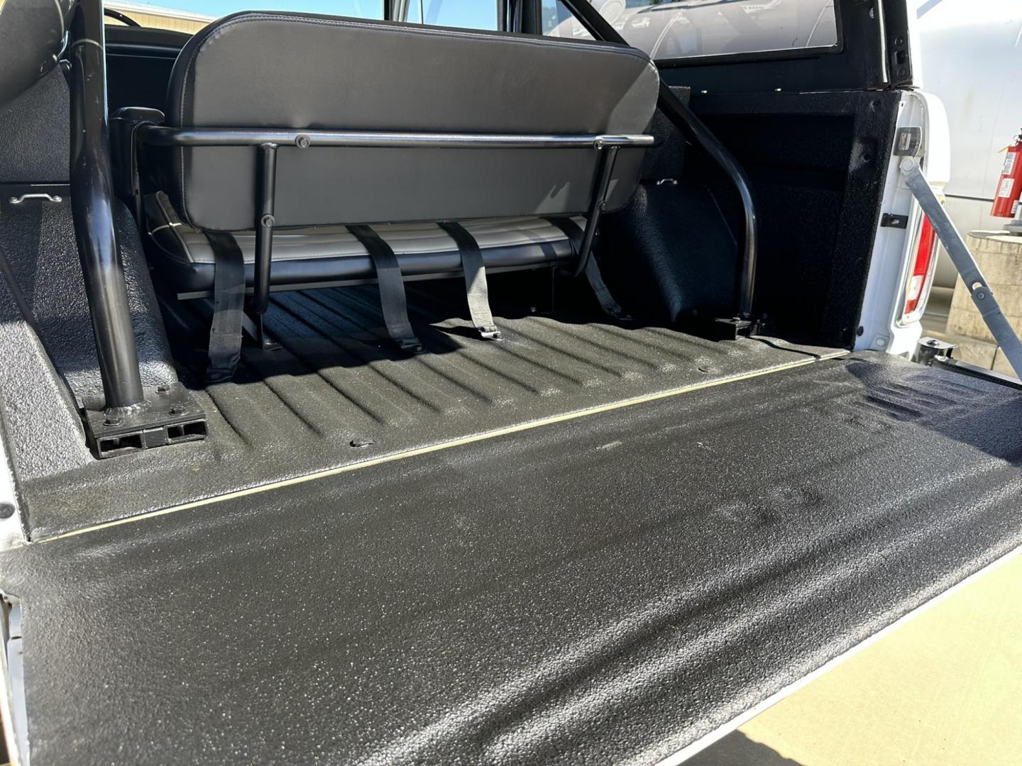 1971 White /Black / Grey Ford Bronco (U15GLK86693) with an 302 engine, np 435 4 speed transmission, located at 2630 Grass Valley Highway, Auburn, CA, 95603, (530) 508-5100, 38.937893, -121.095482 - 1971 FORD BRONCO BUILD CALIFORNIA BRONCO HARD TOP AND NO RUST REBUILT 302 WITH PERFORMANCE CAM, EDELBROCK MANIFOLD, HOLLEY AVENGER 650 CARB & MSD IGNITION NP 435 4 SPEED WITH WILD HORSE BILLET SHIFT EXTENDER DANA 20 WITH WILD HORSE TWIN STICK TRANSFER CASE NEW PAINLESS WIRING HARNESS RHINO LIN - Photo#127
