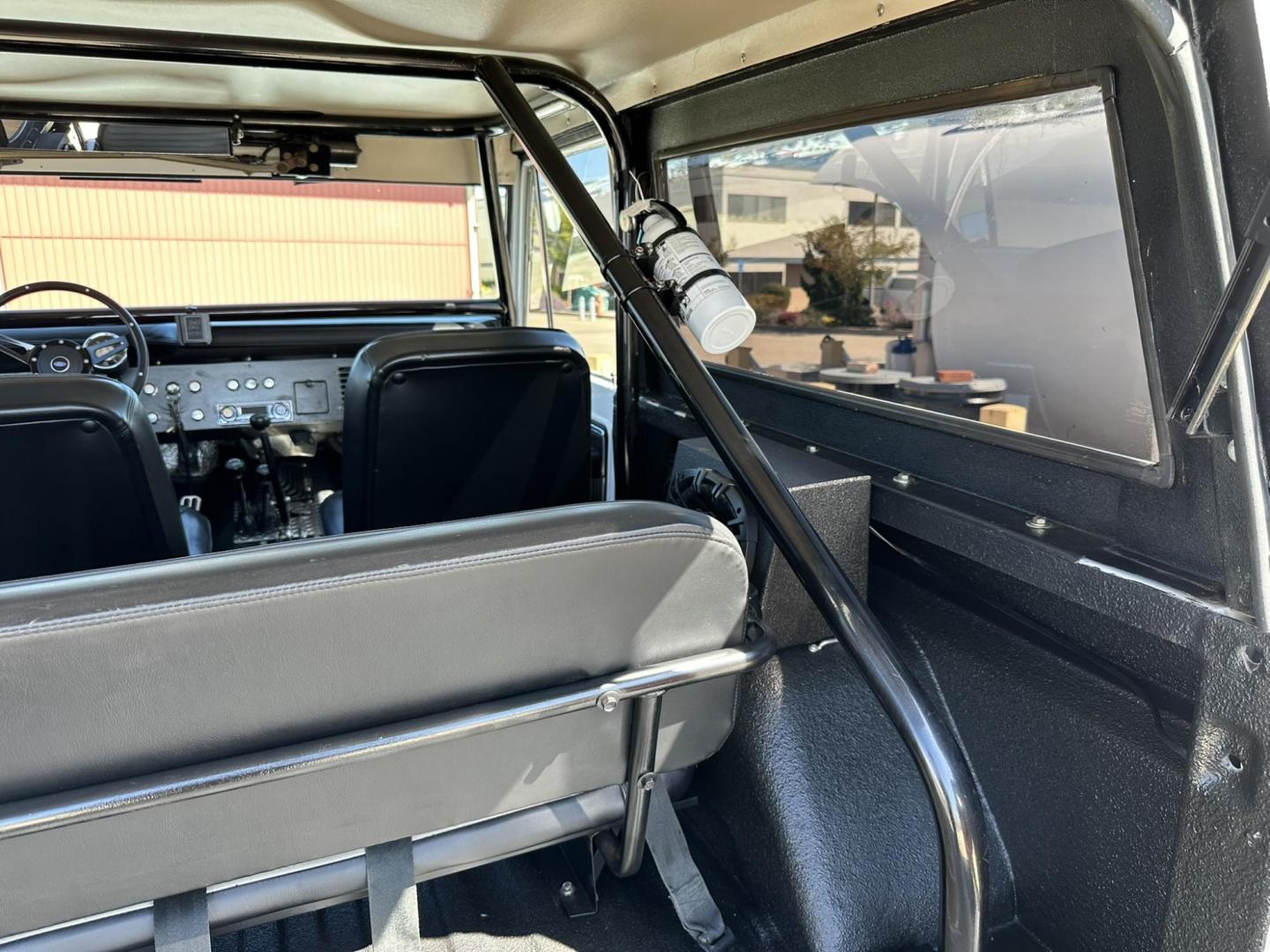 1971 White /Black / Grey Ford Bronco (U15GLK86693) with an 302 engine, np 435 4 speed transmission, located at 2630 Grass Valley Highway, Auburn, CA, 95603, (530) 508-5100, 38.937893, -121.095482 - 1971 FORD BRONCO BUILD CALIFORNIA BRONCO HARD TOP AND NO RUST REBUILT 302 WITH PERFORMANCE CAM, EDELBROCK MANIFOLD, HOLLEY AVENGER 650 CARB & MSD IGNITION NP 435 4 SPEED WITH WILD HORSE BILLET SHIFT EXTENDER DANA 20 WITH WILD HORSE TWIN STICK TRANSFER CASE NEW PAINLESS WIRING HARNESS RHINO LIN - Photo#128