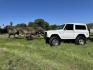 1971 White /Black / Grey Ford Bronco (U15GLK86693) with an 302 engine, np 435 4 speed transmission, located at 2630 Grass Valley Highway, Auburn, CA, 95603, (530) 508-5100, 38.937893, -121.095482 - 1971 FORD BRONCO BUILD CALIFORNIA BRONCO HARD TOP AND NO RUST REBUILT 302 WITH PERFORMANCE CAM, EDELBROCK MANIFOLD, HOLLEY AVENGER 650 CARB & MSD IGNITION NP 435 4 SPEED WITH WILD HORSE BILLET SHIFT EXTENDER DANA 20 WITH WILD HORSE TWIN STICK TRANSFER CASE NEW PAINLESS WIRING HARNESS RHINO LIN - Photo#149