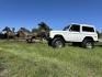 1971 White /Black / Grey Ford Bronco (U15GLK86693) with an 302 engine, np 435 4 speed transmission, located at 2630 Grass Valley Highway, Auburn, CA, 95603, (530) 508-5100, 38.937893, -121.095482 - 1971 FORD BRONCO BUILD CALIFORNIA BRONCO HARD TOP AND NO RUST REBUILT 302 WITH PERFORMANCE CAM, EDELBROCK MANIFOLD, HOLLEY AVENGER 650 CARB & MSD IGNITION NP 435 4 SPEED WITH WILD HORSE BILLET SHIFT EXTENDER DANA 20 WITH WILD HORSE TWIN STICK TRANSFER CASE NEW PAINLESS WIRING HARNESS RHINO LIN - Photo#151