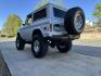 1971 White /Black / Grey Ford Bronco (U15GLK86693) with an 302 engine, np 435 4 speed transmission, located at 2630 Grass Valley Highway, Auburn, CA, 95603, (530) 508-5100, 38.937893, -121.095482 - 1971 FORD BRONCO BUILD CALIFORNIA BRONCO HARD TOP AND NO RUST REBUILT 302 WITH PERFORMANCE CAM, EDELBROCK MANIFOLD, HOLLEY AVENGER 650 CARB & MSD IGNITION NP 435 4 SPEED WITH WILD HORSE BILLET SHIFT EXTENDER DANA 20 WITH WILD HORSE TWIN STICK TRANSFER CASE NEW PAINLESS WIRING HARNESS RHINO LIN - Photo#174