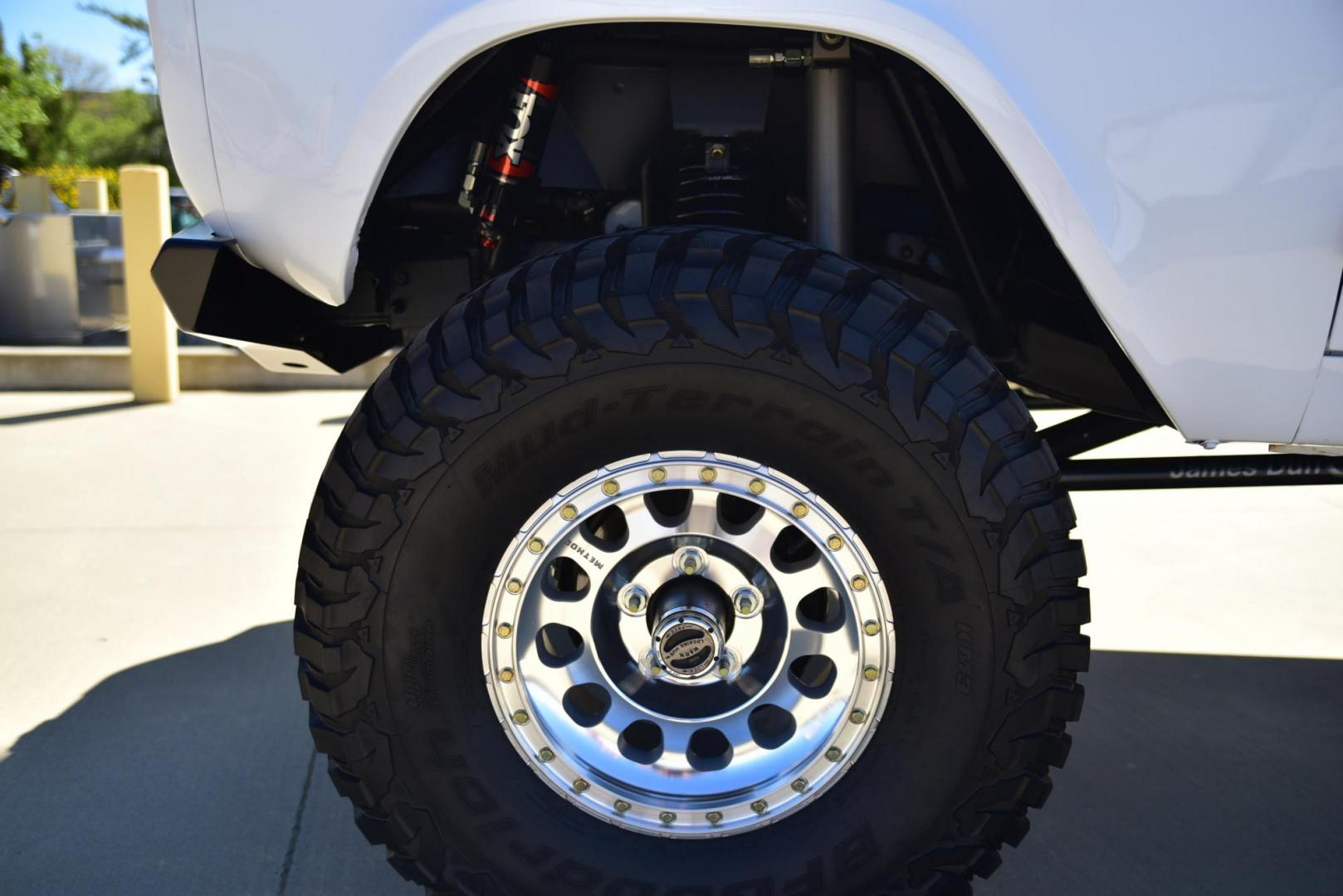 1971 White /Black / Grey Ford Bronco (U15GLK86693) with an 302 engine, np 435 4 speed transmission, located at 2630 Grass Valley Highway, Auburn, CA, 95603, (530) 508-5100, 38.937893, -121.095482 - 1971 FORD BRONCO BUILD CALIFORNIA BRONCO HARD TOP AND NO RUST REBUILT 302 WITH PERFORMANCE CAM, EDELBROCK MANIFOLD, HOLLEY AVENGER 650 CARB & MSD IGNITION NP 435 4 SPEED WITH WILD HORSE BILLET SHIFT EXTENDER DANA 20 WITH WILD HORSE TWIN STICK TRANSFER CASE NEW PAINLESS WIRING HARNESS RHINO LIN - Photo#212