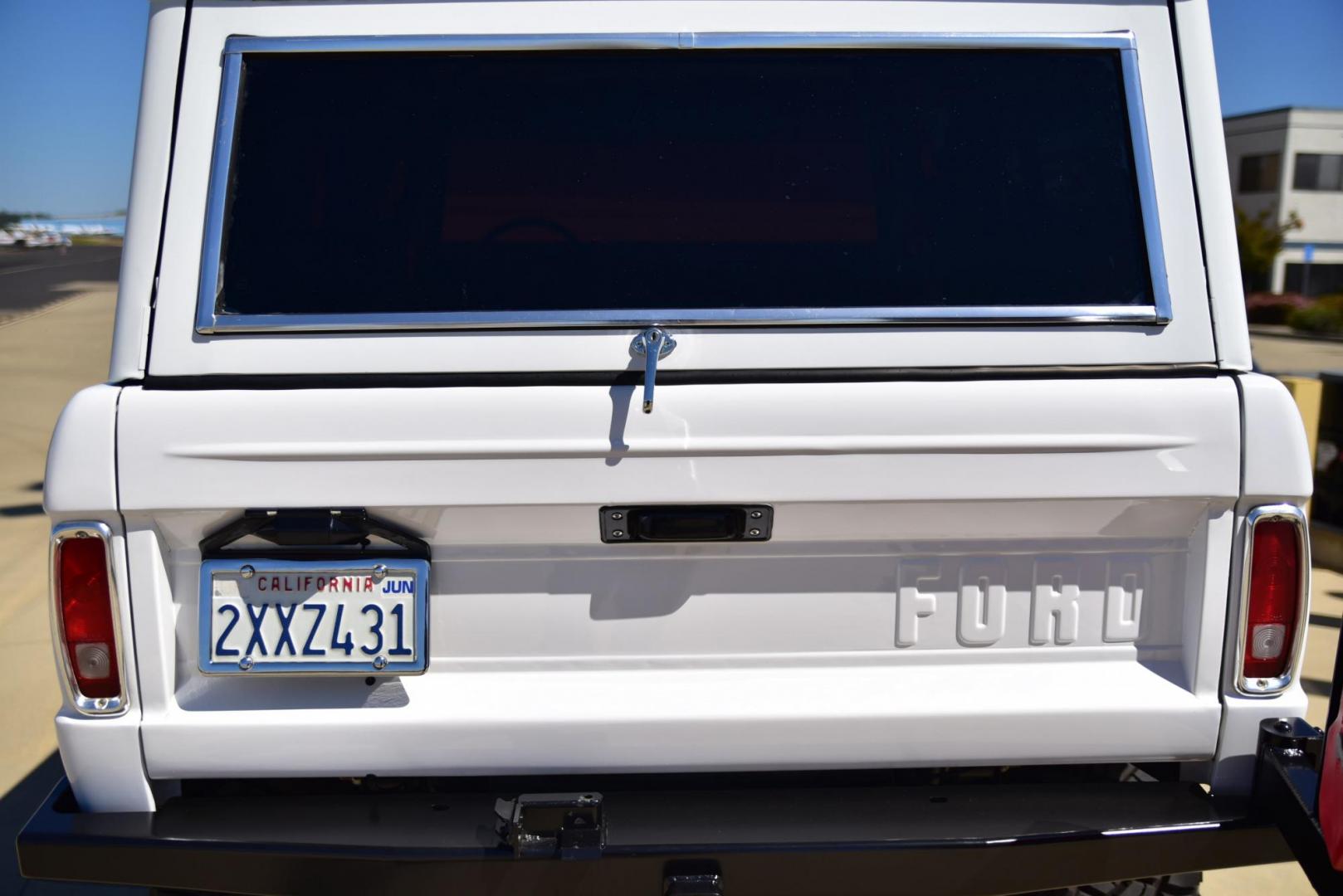 1971 White /Black / Grey Ford Bronco (U15GLK86693) with an 302 engine, np 435 4 speed transmission, located at 2630 Grass Valley Highway, Auburn, CA, 95603, (530) 508-5100, 38.937893, -121.095482 - 1971 FORD BRONCO BUILD CALIFORNIA BRONCO HARD TOP AND NO RUST REBUILT 302 WITH PERFORMANCE CAM, EDELBROCK MANIFOLD, HOLLEY AVENGER 650 CARB & MSD IGNITION NP 435 4 SPEED WITH WILD HORSE BILLET SHIFT EXTENDER DANA 20 WITH WILD HORSE TWIN STICK TRANSFER CASE NEW PAINLESS WIRING HARNESS RHINO LIN - Photo#225