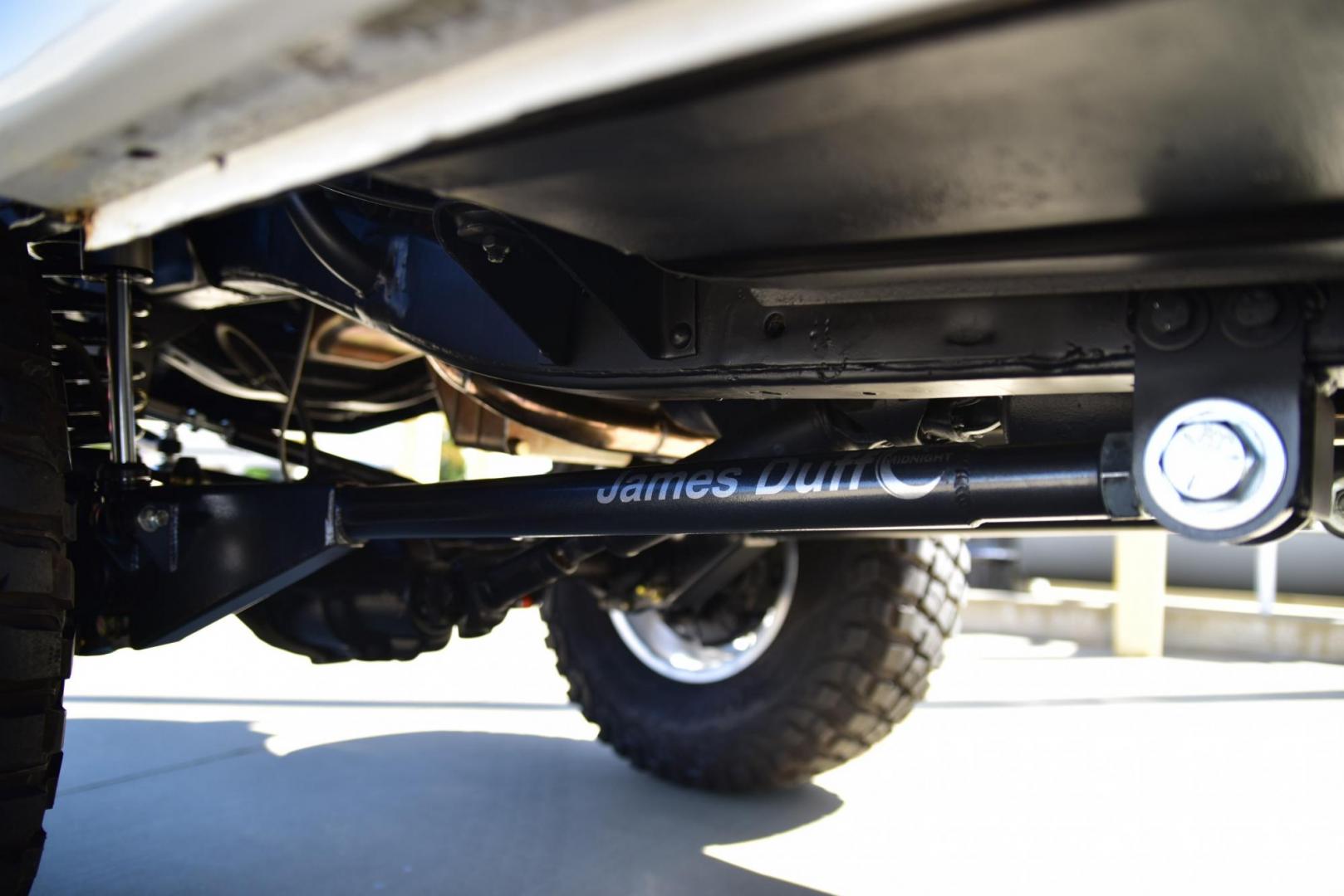 1971 White /Black / Grey Ford Bronco (U15GLK86693) with an 302 engine, np 435 4 speed transmission, located at 2630 Grass Valley Highway, Auburn, CA, 95603, (530) 508-5100, 38.937893, -121.095482 - 1971 FORD BRONCO BUILD CALIFORNIA BRONCO HARD TOP AND NO RUST REBUILT 302 WITH PERFORMANCE CAM, EDELBROCK MANIFOLD, HOLLEY AVENGER 650 CARB & MSD IGNITION NP 435 4 SPEED WITH WILD HORSE BILLET SHIFT EXTENDER DANA 20 WITH WILD HORSE TWIN STICK TRANSFER CASE NEW PAINLESS WIRING HARNESS RHINO LIN - Photo#240