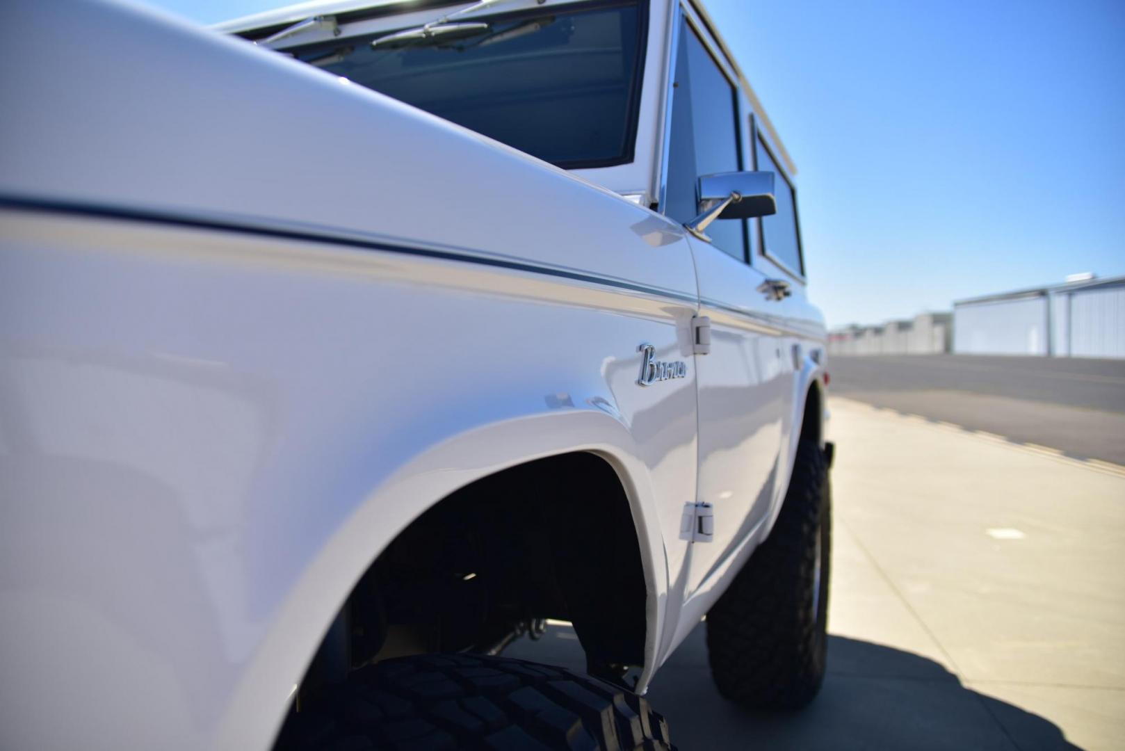 1971 White /Black / Grey Ford Bronco (U15GLK86693) with an 302 engine, np 435 4 speed transmission, located at 2630 Grass Valley Highway, Auburn, CA, 95603, (530) 508-5100, 38.937893, -121.095482 - 1971 FORD BRONCO BUILD CALIFORNIA BRONCO HARD TOP AND NO RUST REBUILT 302 WITH PERFORMANCE CAM, EDELBROCK MANIFOLD, HOLLEY AVENGER 650 CARB & MSD IGNITION NP 435 4 SPEED WITH WILD HORSE BILLET SHIFT EXTENDER DANA 20 WITH WILD HORSE TWIN STICK TRANSFER CASE NEW PAINLESS WIRING HARNESS RHINO LIN - Photo#253