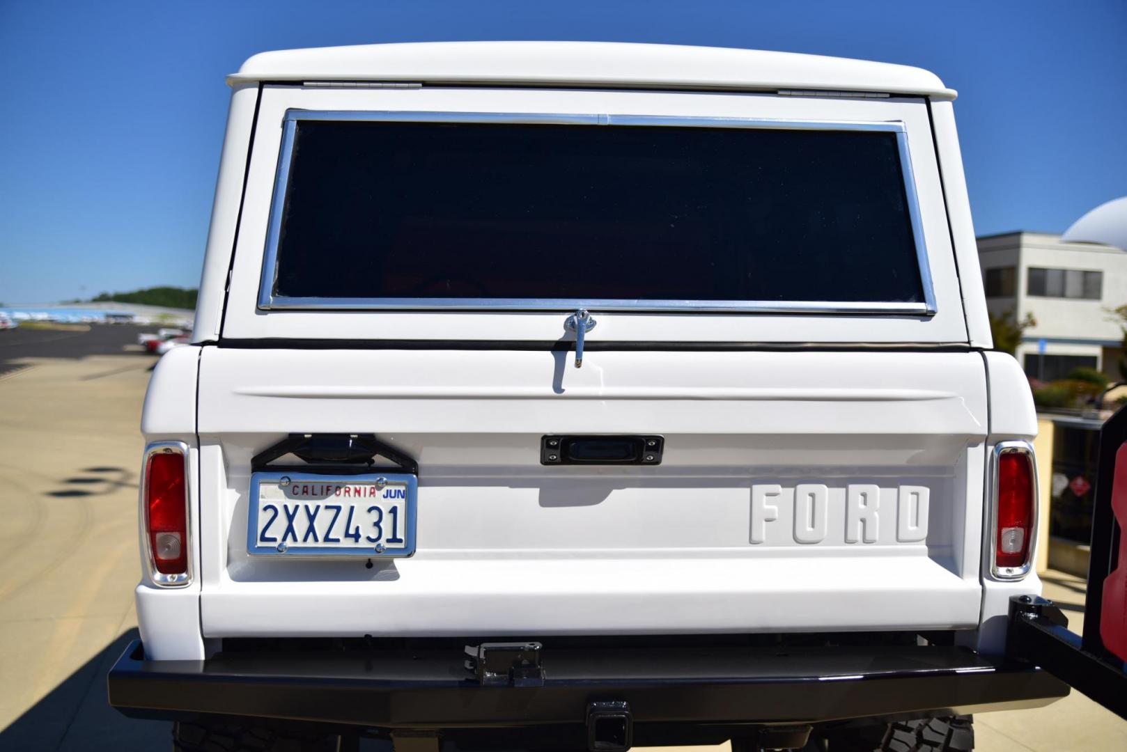 1971 White /Black / Grey Ford Bronco (U15GLK86693) with an 302 engine, np 435 4 speed transmission, located at 2630 Grass Valley Highway, Auburn, CA, 95603, (530) 508-5100, 38.937893, -121.095482 - 1971 FORD BRONCO BUILD CALIFORNIA BRONCO HARD TOP AND NO RUST REBUILT 302 WITH PERFORMANCE CAM, EDELBROCK MANIFOLD, HOLLEY AVENGER 650 CARB & MSD IGNITION NP 435 4 SPEED WITH WILD HORSE BILLET SHIFT EXTENDER DANA 20 WITH WILD HORSE TWIN STICK TRANSFER CASE NEW PAINLESS WIRING HARNESS RHINO LIN - Photo#255