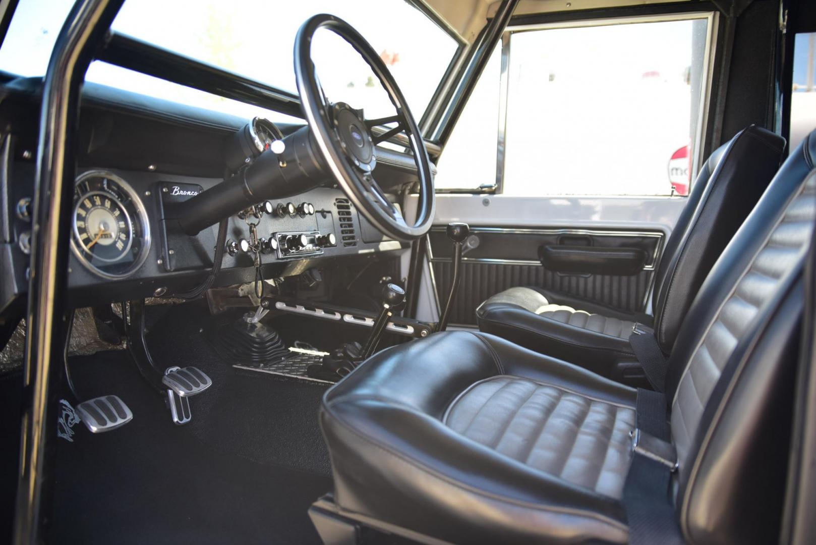 1971 White /Black / Grey Ford Bronco (U15GLK86693) with an 302 engine, np 435 4 speed transmission, located at 2630 Grass Valley Highway, Auburn, CA, 95603, (530) 508-5100, 38.937893, -121.095482 - 1971 FORD BRONCO BUILD CALIFORNIA BRONCO HARD TOP AND NO RUST REBUILT 302 WITH PERFORMANCE CAM, EDELBROCK MANIFOLD, HOLLEY AVENGER 650 CARB & MSD IGNITION NP 435 4 SPEED WITH WILD HORSE BILLET SHIFT EXTENDER DANA 20 WITH WILD HORSE TWIN STICK TRANSFER CASE NEW PAINLESS WIRING HARNESS RHINO LIN - Photo#271