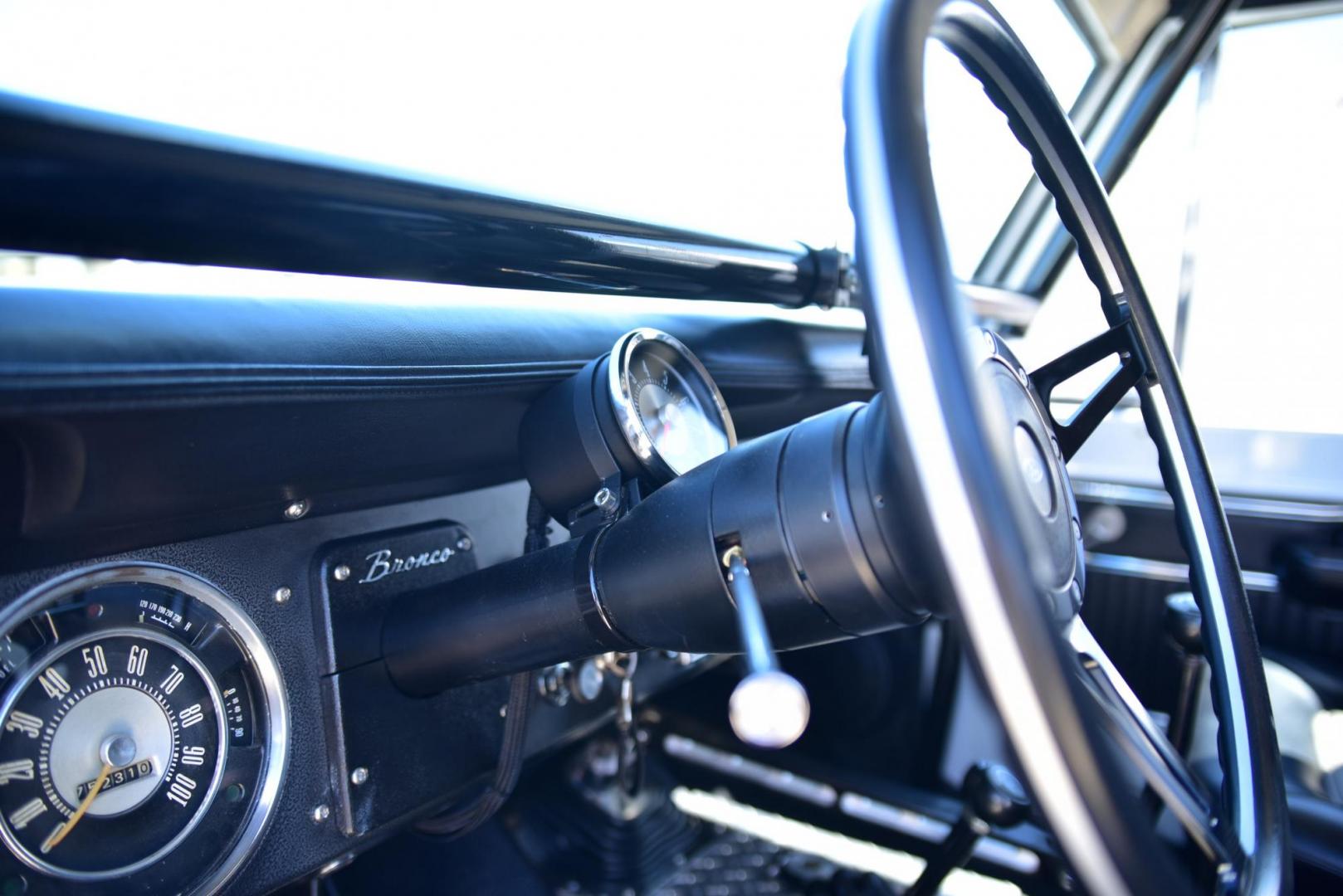 1971 White /Black / Grey Ford Bronco (U15GLK86693) with an 302 engine, np 435 4 speed transmission, located at 2630 Grass Valley Highway, Auburn, CA, 95603, (530) 508-5100, 38.937893, -121.095482 - 1971 FORD BRONCO BUILD CALIFORNIA BRONCO HARD TOP AND NO RUST REBUILT 302 WITH PERFORMANCE CAM, EDELBROCK MANIFOLD, HOLLEY AVENGER 650 CARB & MSD IGNITION NP 435 4 SPEED WITH WILD HORSE BILLET SHIFT EXTENDER DANA 20 WITH WILD HORSE TWIN STICK TRANSFER CASE NEW PAINLESS WIRING HARNESS RHINO LIN - Photo#279