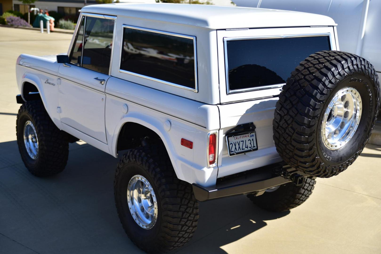 1971 White /Black / Grey Ford Bronco (U15GLK86693) with an 302 engine, np 435 4 speed transmission, located at 2630 Grass Valley Highway, Auburn, CA, 95603, (530) 508-5100, 38.937893, -121.095482 - 1971 FORD BRONCO BUILD CALIFORNIA BRONCO HARD TOP AND NO RUST REBUILT 302 WITH PERFORMANCE CAM, EDELBROCK MANIFOLD, HOLLEY AVENGER 650 CARB & MSD IGNITION NP 435 4 SPEED WITH WILD HORSE BILLET SHIFT EXTENDER DANA 20 WITH WILD HORSE TWIN STICK TRANSFER CASE NEW PAINLESS WIRING HARNESS RHINO LIN - Photo#305