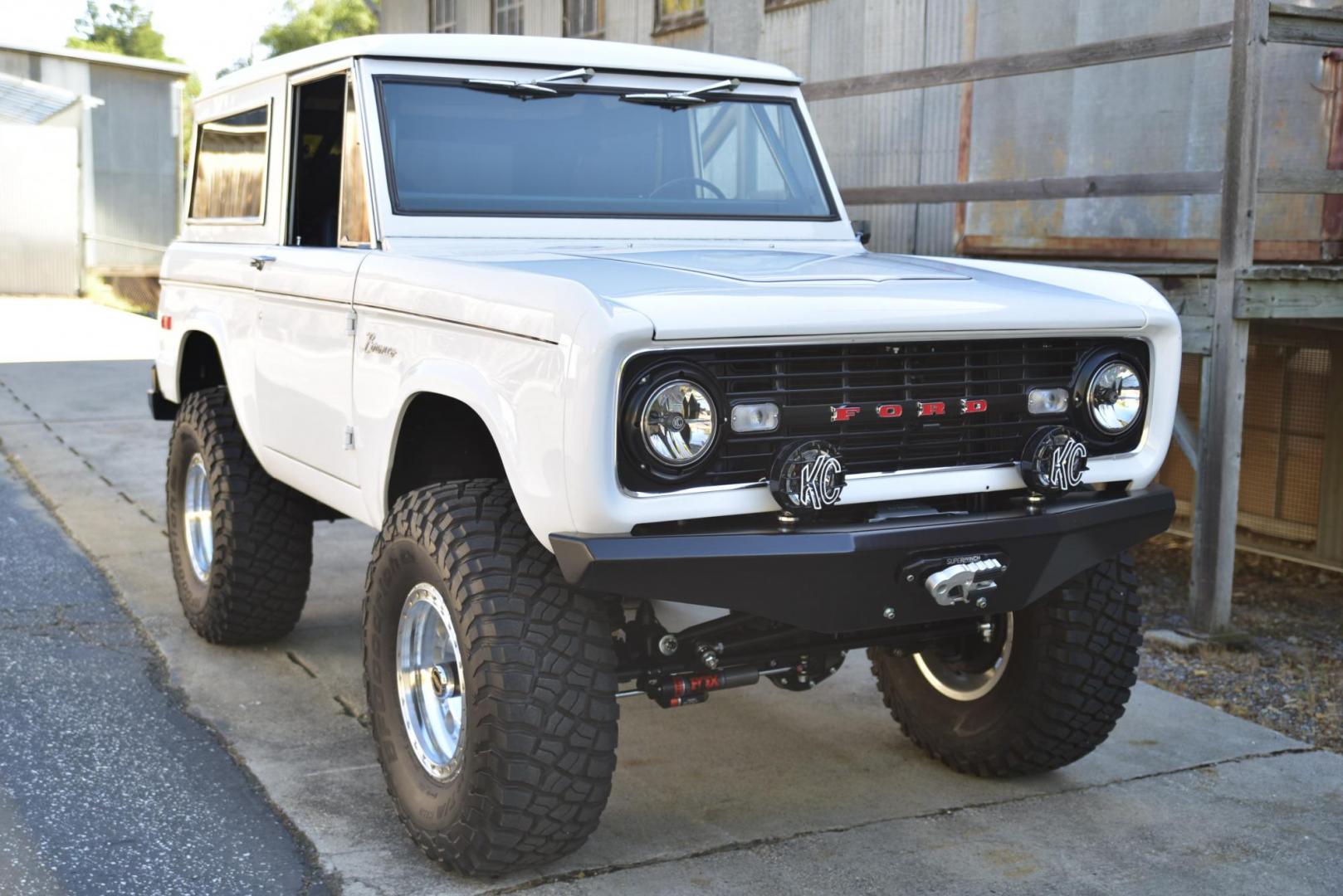 1971 White /Black / Grey Ford Bronco (U15GLK86693) with an 302 engine, np 435 4 speed transmission, located at 2630 Grass Valley Highway, Auburn, CA, 95603, (530) 508-5100, 38.937893, -121.095482 - 1971 FORD BRONCO BUILD CALIFORNIA BRONCO HARD TOP AND NO RUST REBUILT 302 WITH PERFORMANCE CAM, EDELBROCK MANIFOLD, HOLLEY AVENGER 650 CARB & MSD IGNITION NP 435 4 SPEED WITH WILD HORSE BILLET SHIFT EXTENDER DANA 20 WITH WILD HORSE TWIN STICK TRANSFER CASE NEW PAINLESS WIRING HARNESS RHINO LIN - Photo#310