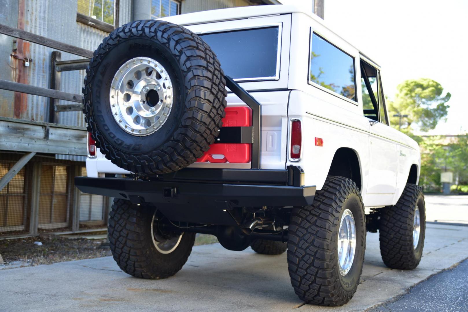 1971 White /Black / Grey Ford Bronco (U15GLK86693) with an 302 engine, np 435 4 speed transmission, located at 2630 Grass Valley Highway, Auburn, CA, 95603, (530) 508-5100, 38.937893, -121.095482 - 1971 FORD BRONCO BUILD CALIFORNIA BRONCO HARD TOP AND NO RUST REBUILT 302 WITH PERFORMANCE CAM, EDELBROCK MANIFOLD, HOLLEY AVENGER 650 CARB & MSD IGNITION NP 435 4 SPEED WITH WILD HORSE BILLET SHIFT EXTENDER DANA 20 WITH WILD HORSE TWIN STICK TRANSFER CASE NEW PAINLESS WIRING HARNESS RHINO LIN - Photo#316