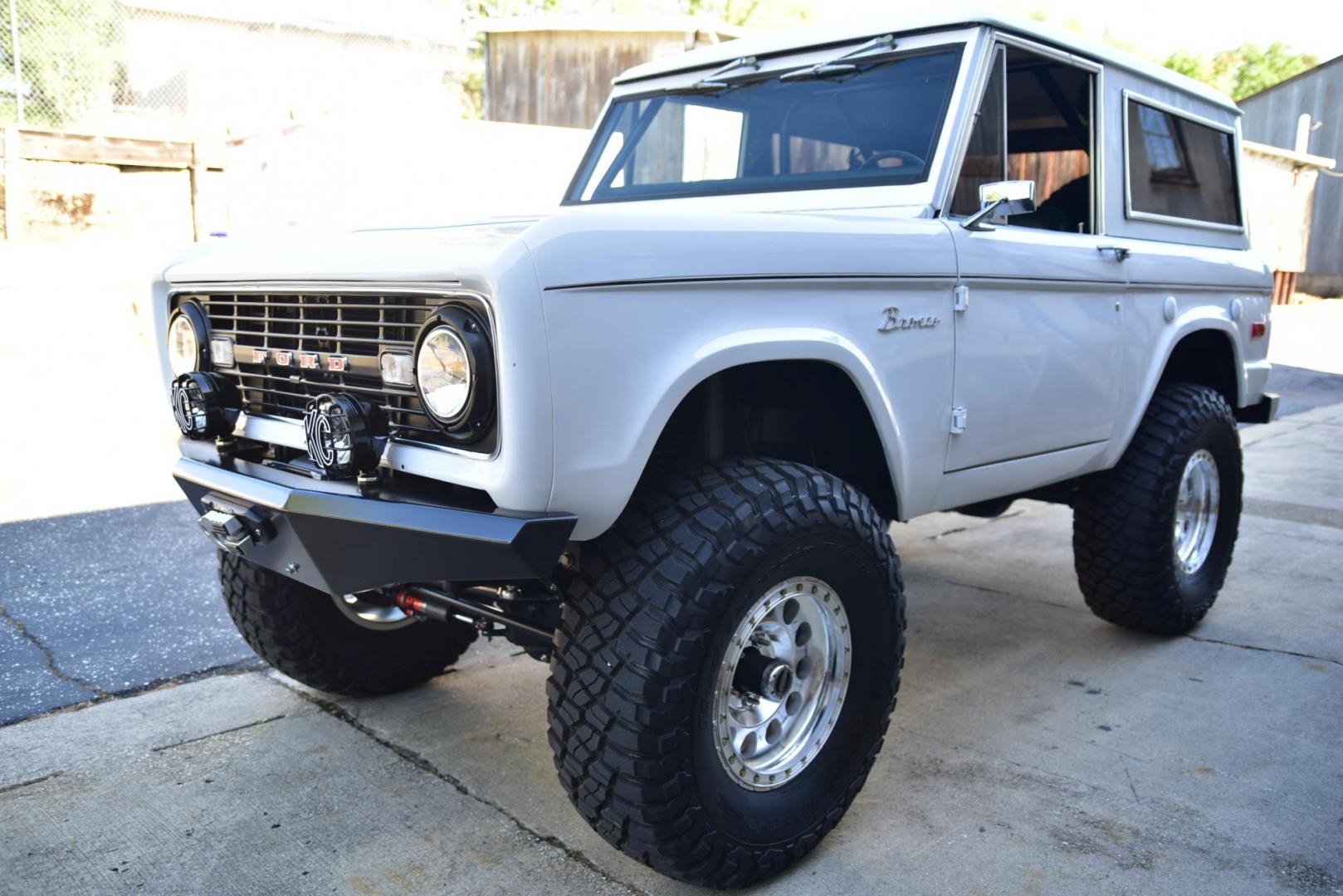 1971 White /Black / Grey Ford Bronco (U15GLK86693) with an 302 engine, np 435 4 speed transmission, located at 2630 Grass Valley Highway, Auburn, CA, 95603, (530) 508-5100, 38.937893, -121.095482 - 1971 FORD BRONCO BUILD CALIFORNIA BRONCO HARD TOP AND NO RUST REBUILT 302 WITH PERFORMANCE CAM, EDELBROCK MANIFOLD, HOLLEY AVENGER 650 CARB & MSD IGNITION NP 435 4 SPEED WITH WILD HORSE BILLET SHIFT EXTENDER DANA 20 WITH WILD HORSE TWIN STICK TRANSFER CASE NEW PAINLESS WIRING HARNESS RHINO LIN - Photo#319
