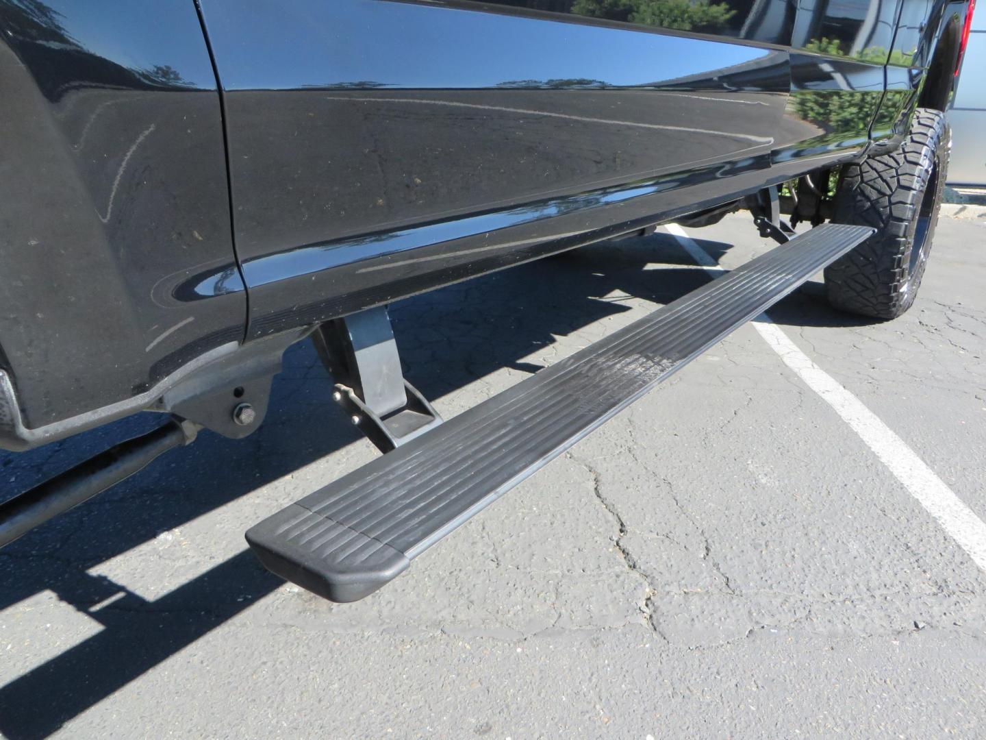 2017 BLACK Ford F-250 SD Platinum Crew Cab Short Bed 4WD (1FT7W2BT0HE) with an 6.7L V8 OHV 16V DIESEL engine, 6A transmission, located at 2630 Grass Valley Highway, Auburn, CA, 95603, (530) 508-5100, 38.937893, -121.095482 - Lifted F-250 featuring a SkyJacker long arm suspension system, Fox 2.5 remote reservoir coilovers, Fox 2.0 rear remote reservoir shocks, Fox dual steering stabilizers, 20" XD wheels, 37" Nitto Ridge Grappler tires, Racer X Mesh Grille, Airlift Air Bags, Painted badges, and window tint. - Photo#13