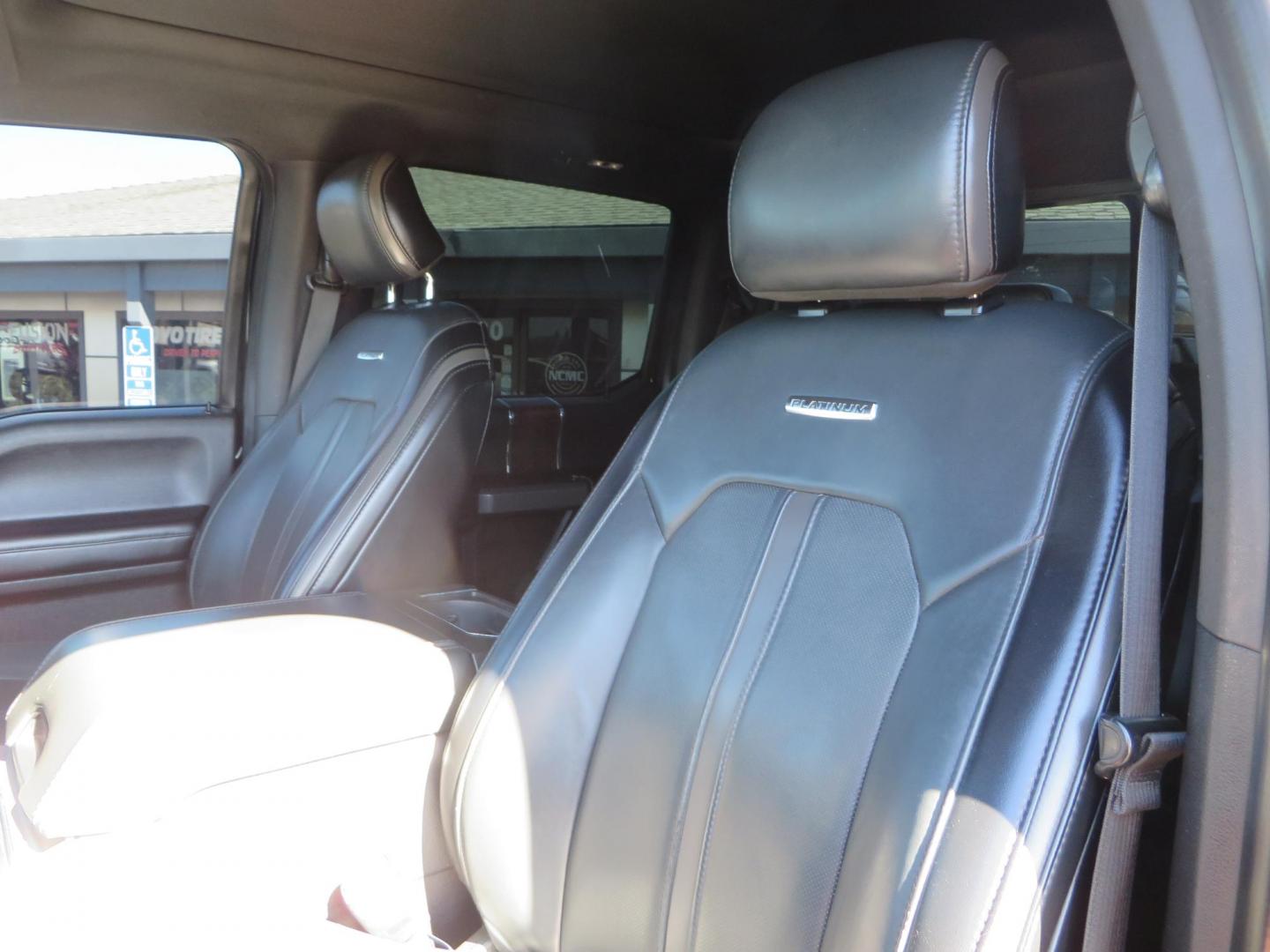 2017 BLACK Ford F-250 SD Platinum Crew Cab Short Bed 4WD (1FT7W2BT0HE) with an 6.7L V8 OHV 16V DIESEL engine, 6A transmission, located at 2630 Grass Valley Highway, Auburn, CA, 95603, (530) 508-5100, 38.937893, -121.095482 - Lifted F-250 featuring a SkyJacker long arm suspension system, Fox 2.5 remote reservoir coilovers, Fox 2.0 rear remote reservoir shocks, Fox dual steering stabilizers, 20" XD wheels, 37" Nitto Ridge Grappler tires, Racer X Mesh Grille, Airlift Air Bags, Painted badges, and window tint. - Photo#27