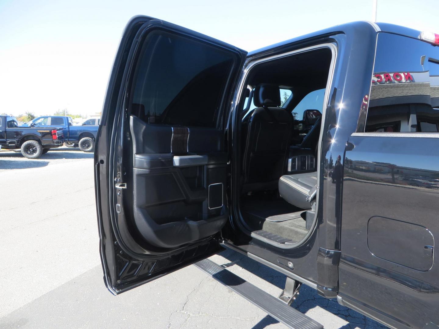 2017 BLACK Ford F-250 SD Platinum Crew Cab Short Bed 4WD (1FT7W2BT0HE) with an 6.7L V8 OHV 16V DIESEL engine, 6A transmission, located at 2630 Grass Valley Highway, Auburn, CA, 95603, (530) 508-5100, 38.937893, -121.095482 - Lifted F-250 featuring a SkyJacker long arm suspension system, Fox 2.5 remote reservoir coilovers, Fox 2.0 rear remote reservoir shocks, Fox dual steering stabilizers, 20" XD wheels, 37" Nitto Ridge Grappler tires, Racer X Mesh Grille, Airlift Air Bags, Painted badges, and window tint. - Photo#52