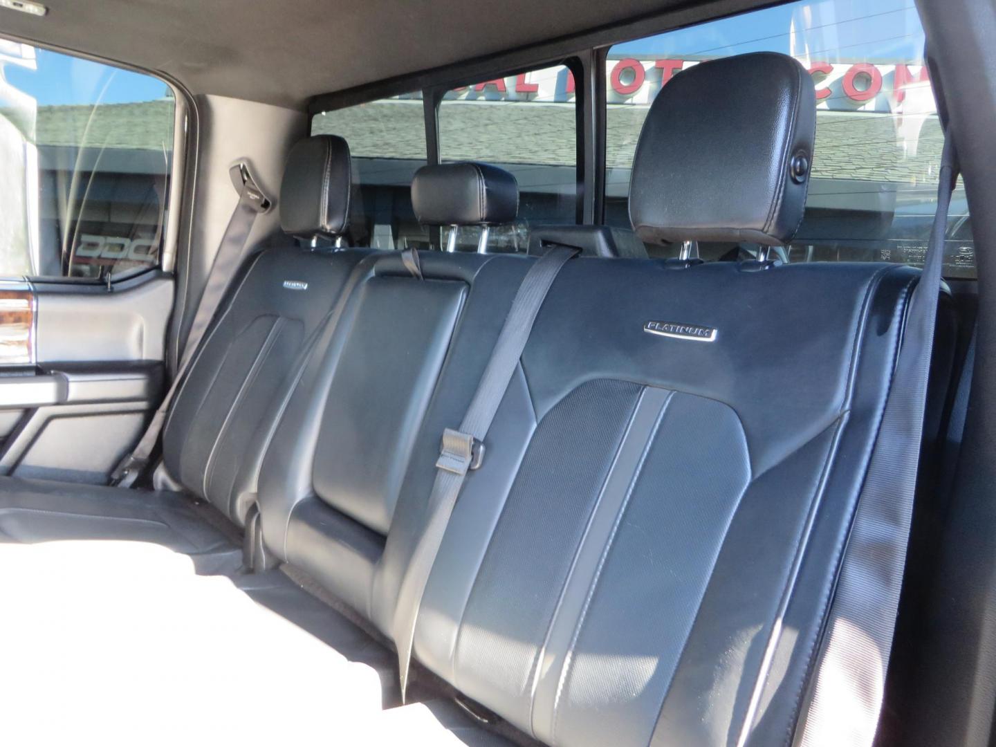 2017 BLACK Ford F-250 SD Platinum Crew Cab Short Bed 4WD (1FT7W2BT0HE) with an 6.7L V8 OHV 16V DIESEL engine, 6A transmission, located at 2630 Grass Valley Highway, Auburn, CA, 95603, (530) 508-5100, 38.937893, -121.095482 - Lifted F-250 featuring a SkyJacker long arm suspension system, Fox 2.5 remote reservoir coilovers, Fox 2.0 rear remote reservoir shocks, Fox dual steering stabilizers, 20" XD wheels, 37" Nitto Ridge Grappler tires, Racer X Mesh Grille, Airlift Air Bags, Painted badges, and window tint. - Photo#54