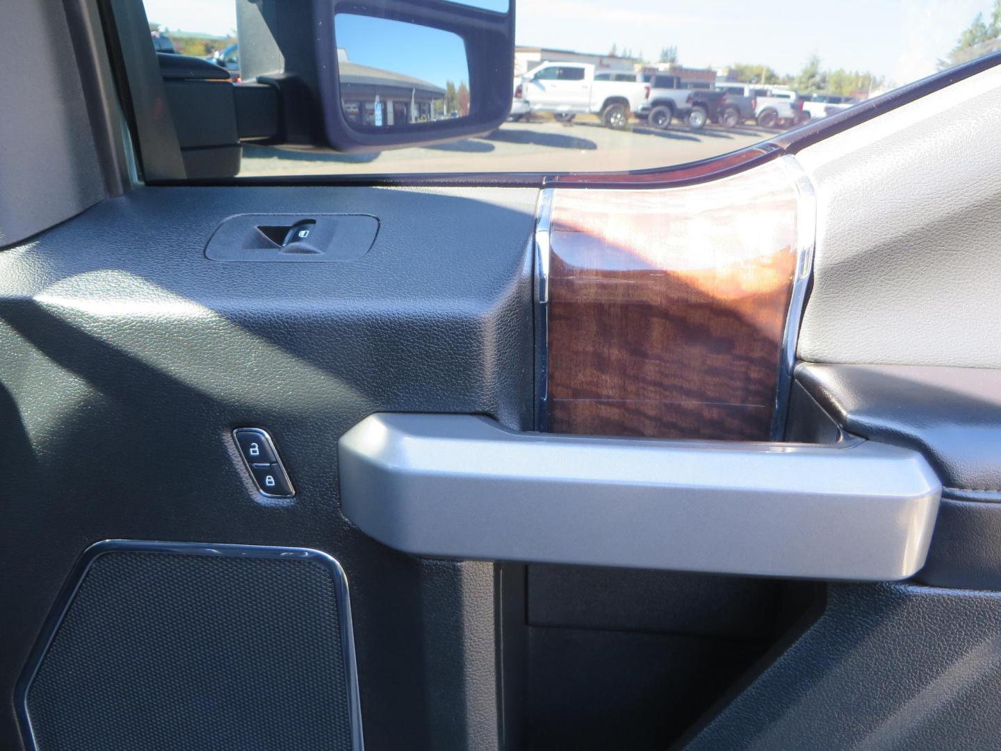 2017 BLACK Ford F-250 SD Platinum Crew Cab Short Bed 4WD (1FT7W2BT0HE) with an 6.7L V8 OHV 16V DIESEL engine, 6A transmission, located at 2630 Grass Valley Highway, Auburn, CA, 95603, (530) 508-5100, 38.937893, -121.095482 - Lifted F-250 featuring a SkyJacker long arm suspension system, Fox 2.5 remote reservoir coilovers, Fox 2.0 rear remote reservoir shocks, Fox dual steering stabilizers, 20" XD wheels, 37" Nitto Ridge Grappler tires, Racer X Mesh Grille, Airlift Air Bags, Painted badges, and window tint. - Photo#61
