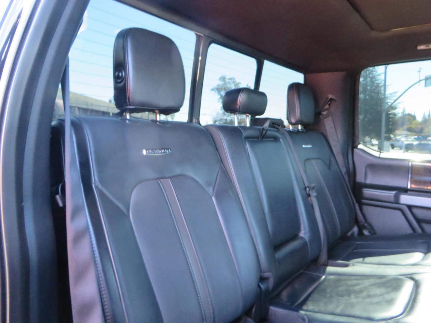 2017 BLACK Ford F-250 SD Platinum Crew Cab Short Bed 4WD (1FT7W2BT0HE) with an 6.7L V8 OHV 16V DIESEL engine, 6A transmission, located at 2630 Grass Valley Highway, Auburn, CA, 95603, (530) 508-5100, 38.937893, -121.095482 - Lifted F-250 featuring a SkyJacker long arm suspension system, Fox 2.5 remote reservoir coilovers, Fox 2.0 rear remote reservoir shocks, Fox dual steering stabilizers, 20" XD wheels, 37" Nitto Ridge Grappler tires, Racer X Mesh Grille, Airlift Air Bags, Painted badges, and window tint. - Photo#69