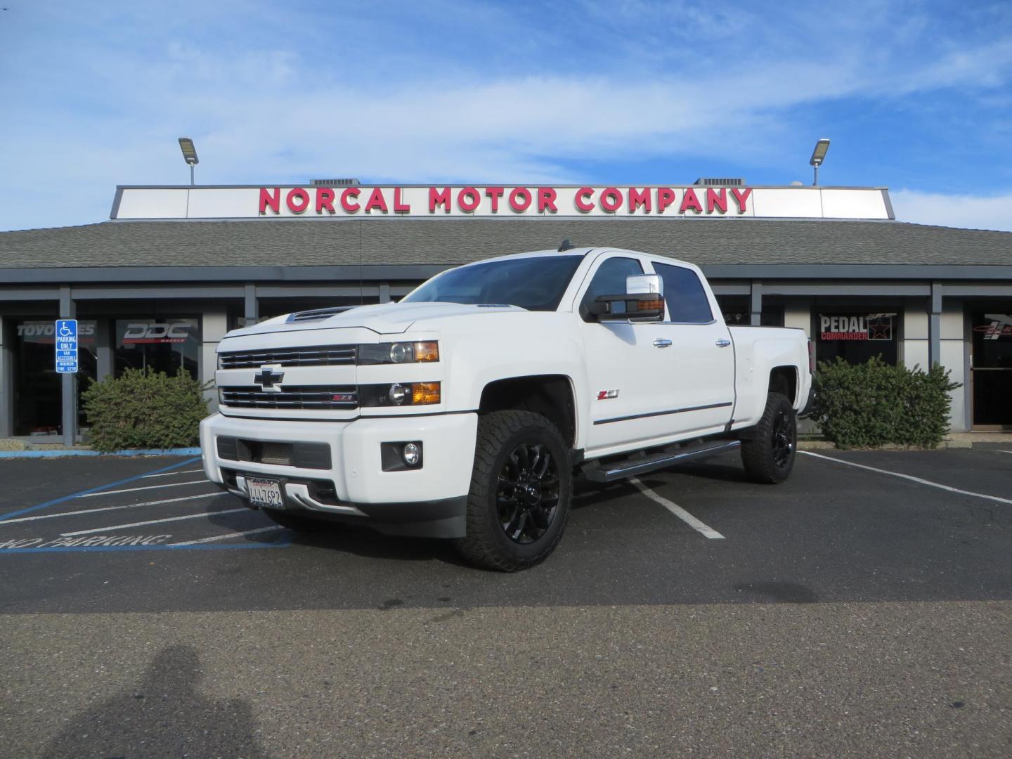 2019 White /black Chevrolet Silverado 2500HD LTZ 4WD (1GC1KTEY6KF) with an 6.6L V8 OHV 16V DIESEL engine, 6A transmission, located at 2630 Grass Valley Highway, Auburn, CA, 95603, (530) 508-5100, 38.937893, -121.095482 - Photo#0