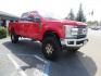 2017 Red Ford F-250 SD Lariat Crew Cab Long Bed 4WD (1FT7W2BT7HE) with an 6.7L V8 OHV 16V DIESEL engine, 6A transmission, located at 2630 Grass Valley Highway, Auburn, CA, 95603, (530) 508-5100, 38.937893, -121.095482 - Super Clean Lariat Superduty sitting on Carli Pintop suspension system, King 2.5 remote reservoir shocks, Radius Arms, High Mount stabilizer, Torsion Sway bar, and Deaver rear leaf springs, 38" Falken Wildpeak RT tires, 17" Innov8 G400 wheels, and window tint. - Photo#2