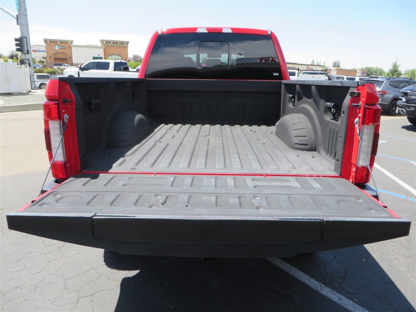 2017 Red Ford F-250 SD Lariat Crew Cab Long Bed 4WD (1FT7W2BT7HE) with an 6.7L V8 OHV 16V DIESEL engine, 6A transmission, located at 2630 Grass Valley Highway, Auburn, CA, 95603, (530) 508-5100, 38.937893, -121.095482 - Super Clean Lariat Superduty sitting on Carli Pintop suspension system, King 2.5 remote reservoir shocks, Radius Arms, High Mount stabilizer, Torsion Sway bar, and Deaver rear leaf springs, 38" Falken Wildpeak RT tires, 17" Method 315 wheels , and window tint. - Photo#17