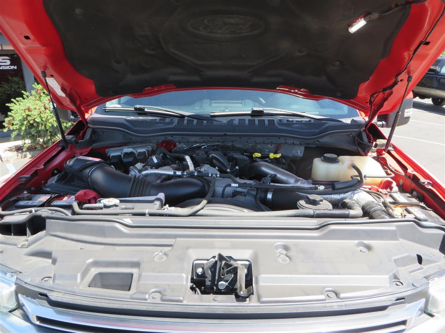 2017 Red Ford F-250 SD Lariat Crew Cab Long Bed 4WD (1FT7W2BT7HE) with an 6.7L V8 OHV 16V DIESEL engine, 6A transmission, located at 2630 Grass Valley Highway, Auburn, CA, 95603, (530) 508-5100, 38.937893, -121.095482 - Super Clean Lariat Superduty sitting on Carli Pintop suspension system, King 2.5 remote reservoir shocks, Radius Arms, High Mount stabilizer, Torsion Sway bar, and Deaver rear leaf springs, 38" Falken Wildpeak RT tires, 17" Method 315 wheels , and window tint. - Photo#74