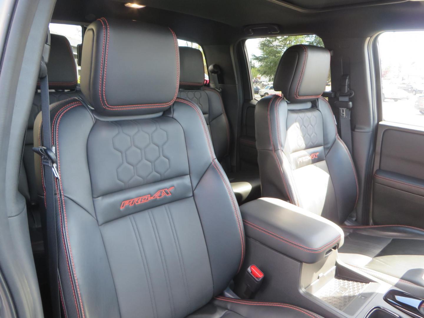 2023 CHARCOAL /Black Nissan Frontier PRO-4X Crew Cab 4WD (1N6ED1EK3PN) with an 3.8L V6 DOHC 24V engine, 9A transmission, located at 2630 Grass Valley Highway, Auburn, CA, 95603, (530) 508-5100, 38.937893, -121.095482 - Frontier PRO-4X like new. - Photo#53