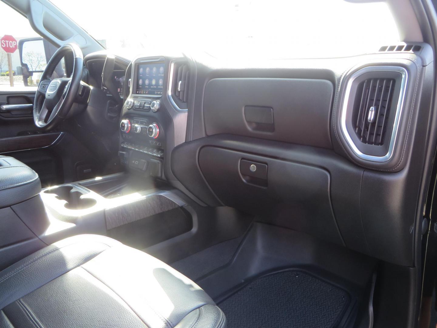 2022 BLACK /BLACK GMC Sierra 2500HD Denali Crew Cab 4WD (1GT49REY2NF) with an 6.6L V8 OHV 16 DIESEL engine, 6A transmission, located at 2630 Grass Valley Highway, Auburn, CA, 95603, (530) 508-5100, 38.937893, -121.095482 - Features- A Cognito Level kit with Fox 2.0 Shocks, 37" Nitto Ridge Grappler tires, 18" Method NV wheels, Black Cat Back Exhaust, Bakflip MX4, window tint, and a factory Kicker tailgate audio system. - Photo#56