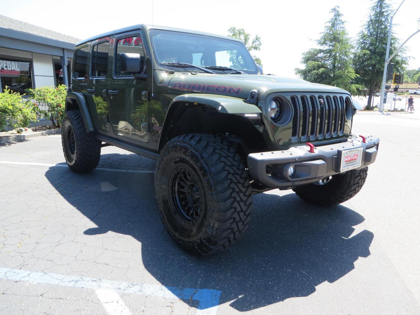2021 GREEN Jeep Wrangler Unlimited Rubicon (1C4JJXFM6MW) with an 3.0L V6 DOHC 24V TURBO DIESEL engine, 6A transmission, located at 2630 Grass Valley Highway, Auburn, CA, 95603, (530) 508-5100, 38.937893, -121.095482 - Eco Diesel Rubicon features a JKS suspension system, Fox adventure series shocks, 17" Fuel Rincon wheels, 37" Toyo MT tires, Metal Cloak front fender guts delete, Body Armor front inner fender liners, DV8 rocker guards, Teraflex HD spare tire relocation, and Morimoto Headlights. - Photo#2