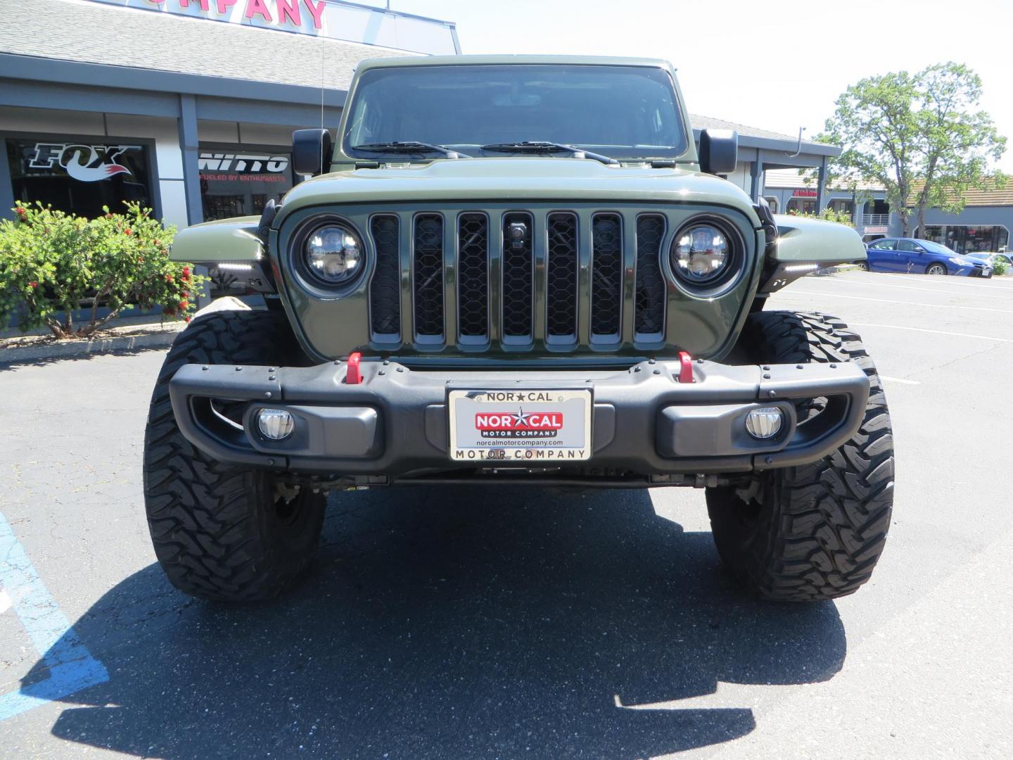 2021 GREEN Jeep Wrangler Unlimited Rubicon (1C4JJXFM6MW) with an 3.0L V6 DOHC 24V TURBO DIESEL engine, 6A transmission, located at 2630 Grass Valley Highway, Auburn, CA, 95603, (530) 508-5100, 38.937893, -121.095482 - Eco Diesel Rubicon features a JKS suspension system, Fox adventure series shocks, 17" Fuel Rincon wheels, 37" Toyo MT tires, Metal Cloak front fender guts delete, Body Armor front inner fender liners, DV8 rocker guards, Teraflex HD spare tire relocation, and Morimoto Headlights. - Photo#1