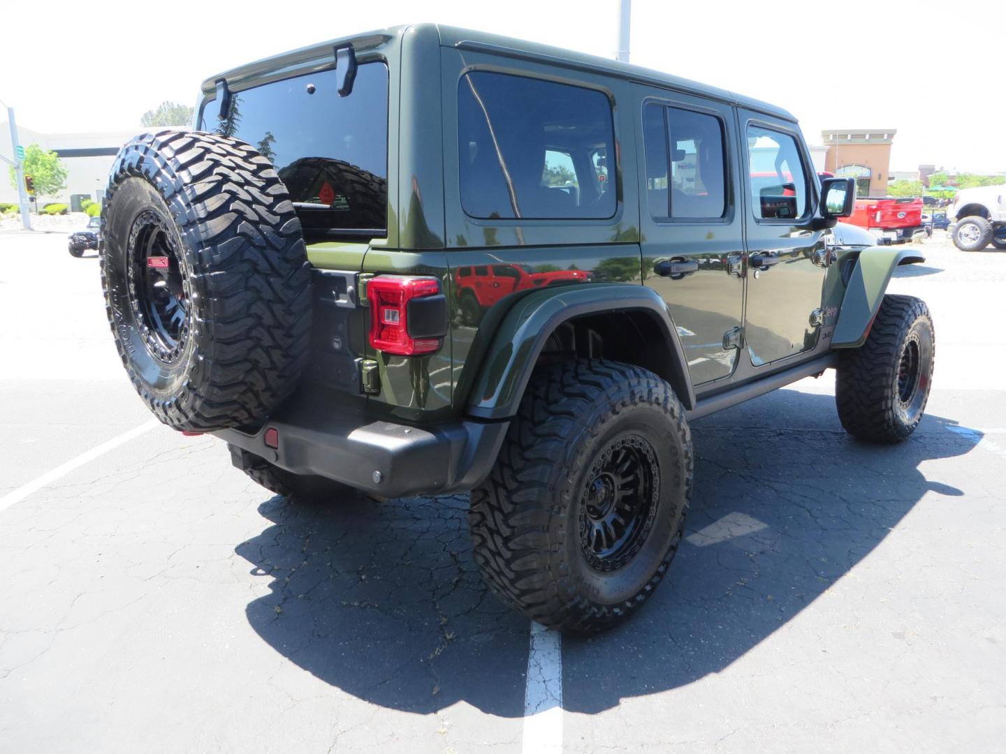 2021 GREEN Jeep Wrangler Unlimited Rubicon (1C4JJXFM6MW) with an 3.0L V6 DOHC 24V TURBO DIESEL engine, 6A transmission, located at 2630 Grass Valley Highway, Auburn, CA, 95603, (530) 508-5100, 38.937893, -121.095482 - Eco Diesel Rubicon features a JKS suspension system, Fox adventure series shocks, 17" Fuel Rincon wheels, 37" Toyo MT tires, Metal Cloak front fender guts delete, Body Armor front inner fender liners, DV8 rocker guards, Teraflex HD spare tire relocation, and Morimoto Headlights. - Photo#4