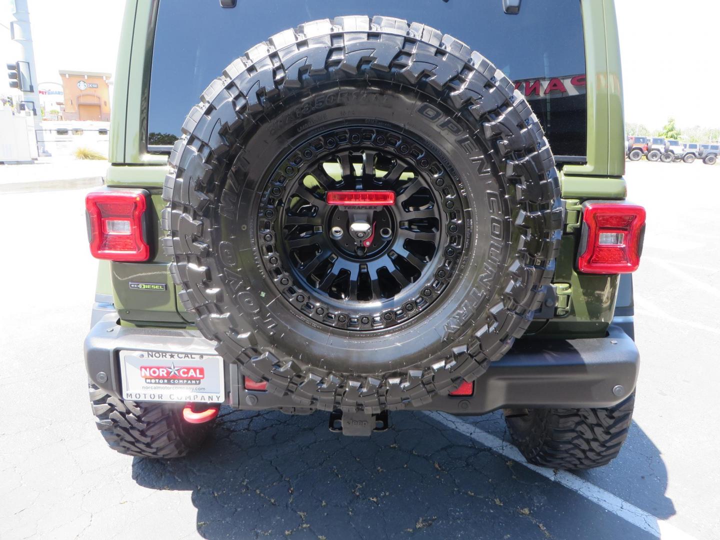 2021 GREEN Jeep Wrangler Unlimited Rubicon (1C4JJXFM6MW) with an 3.0L V6 DOHC 24V TURBO DIESEL engine, 6A transmission, located at 2630 Grass Valley Highway, Auburn, CA, 95603, (530) 508-5100, 38.937893, -121.095482 - Eco Diesel Rubicon features a JKS suspension system, Fox adventure series shocks, 17" Fuel Rincon wheels, 37" Toyo MT tires, Metal Cloak front fender guts delete, Body Armor front inner fender liners, DV8 rocker guards, Teraflex HD spare tire relocation, and Morimoto Headlights. - Photo#15