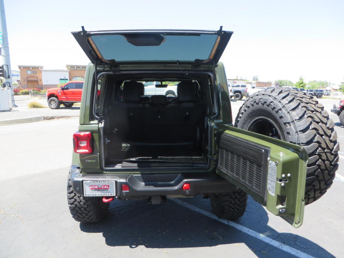 2021 GREEN Jeep Wrangler Unlimited Rubicon (1C4JJXFM6MW) with an 3.0L V6 DOHC 24V TURBO DIESEL engine, 6A transmission, located at 2630 Grass Valley Highway, Auburn, CA, 95603, (530) 508-5100, 38.937893, -121.095482 - Eco Diesel Rubicon features a JKS suspension system, Fox adventure series shocks, 17" Fuel Rincon wheels, 37" Toyo MT tires, Metal Cloak front fender guts delete, Body Armor front inner fender liners, DV8 rocker guards, Teraflex HD spare tire relocation, and Morimoto Headlights. - Photo#67