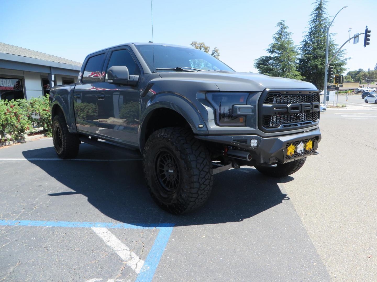 2018 Gray Ford F-150 Raptor SuperCrew 4WD (1FTFW1RG4JF) with an 3.5 V6 engine, 6A transmission, located at 2630 Grass Valley Highway, Auburn, CA, 95603, (530) 508-5100, 38.937893, -121.095482 - Must see Raptor with a bunch of new accessories. We just install Fox 3.0 live valve coilovers and rear shocks, Fox IFP rear bumps with SVC bump stop brackets, SDI E Click, Addictive Desert Designs front and rear bumpers, Baja Designs Led lighting, Addictive Desert Designs Intercooler, KMC Impact for - Photo#2