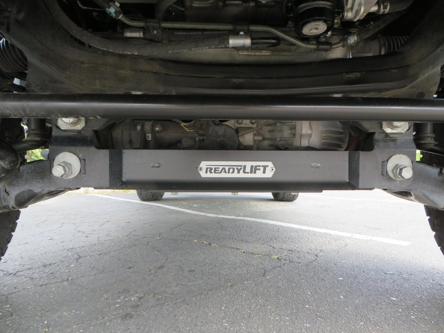 2021 CHARCOAL /BLACK Toyota Tundra Limited 5.7L CrewMax 4WD (5TFHY5F15MX) with an 5.7L V8 DOHC 32V engine, 6A transmission, located at 2630 Grass Valley Highway, Auburn, CA, 95603, (530) 508-5100, 38.937893, -121.095482 - Features - 8" Readylift suspension system, Falcon rear shocks, 17" Method MR315 wheels, 37" Toyo RT Trail tires, and Running boards. - Photo#9