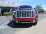 2024 Volcanic Red /Black GMC Sierra 2500HD Denali Crew Cab 4WD SB (1GT49REY6RF) with an 6.6L V8 OHV 16V TURBO DIESEL engine, 6A transmission, located at 2630 Grass Valley Highway, Auburn, CA, 95603, (530) 508-5100, 38.937893, -121.095482 - Denali 2500 featuring a Cognito Level kit, Fox shocks, 20" Fittipaldi FA18 wheels, 35" Nitto Ridge Grappler tires, and a LineX folding tonneau cover. - Photo#1