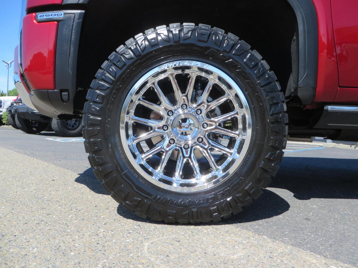 2024 Volcanic Red /Black GMC Sierra 2500HD Denali Crew Cab 4WD SB (1GT49REY6RF) with an 6.6L V8 OHV 16V TURBO DIESEL engine, 6A transmission, located at 2630 Grass Valley Highway, Auburn, CA, 95603, (530) 508-5100, 38.937893, -121.095482 - Denali 2500 featuring a Cognito Level kit, Fox shocks, 20" Fittipaldi FA18 wheels, 35" Nitto Ridge Grappler tires, and a LineX folding tonneau cover. - Photo#8