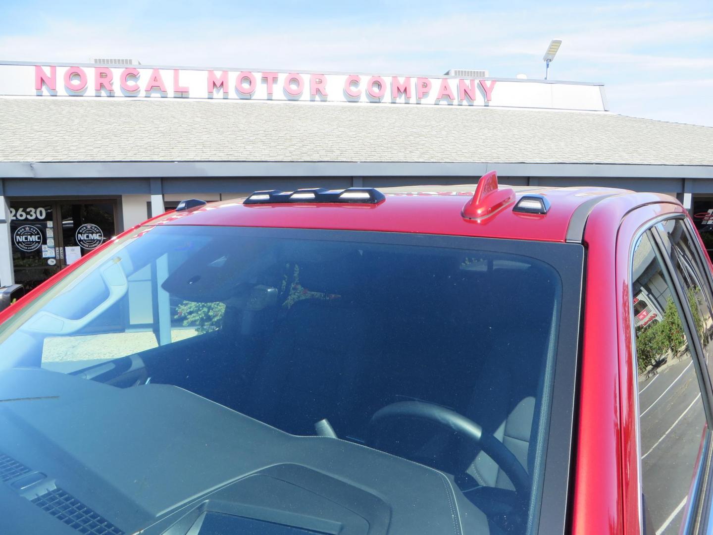 2024 Volcanic Red /Black GMC Sierra 2500HD Denali Crew Cab 4WD SB (1GT49REY6RF) with an 6.6L V8 OHV 16V TURBO DIESEL engine, 6A transmission, located at 2630 Grass Valley Highway, Auburn, CA, 95603, (530) 508-5100, 38.937893, -121.095482 - Denali 2500 featuring a Cognito Level kit, Fox shocks, 20" Fittipaldi FA18 wheels, 35" Nitto Ridge Grappler tires, and a LineX folding tonneau cover. - Photo#13