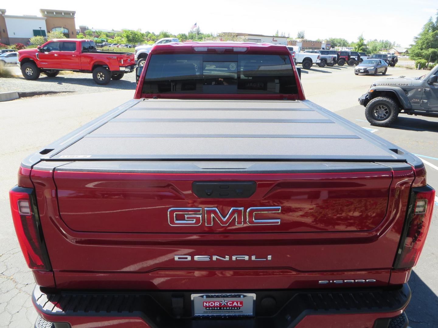 2024 Volcanic Red /Black GMC Sierra 2500HD Denali Crew Cab 4WD SB (1GT49REY6RF) with an 6.6L V8 OHV 16V TURBO DIESEL engine, 6A transmission, located at 2630 Grass Valley Highway, Auburn, CA, 95603, (530) 508-5100, 38.937893, -121.095482 - Denali 2500 featuring a Cognito Level kit, Fox shocks, 20" Fittipaldi FA18 wheels, 35" Nitto Ridge Grappler tires, and a LineX folding tonneau cover. - Photo#18