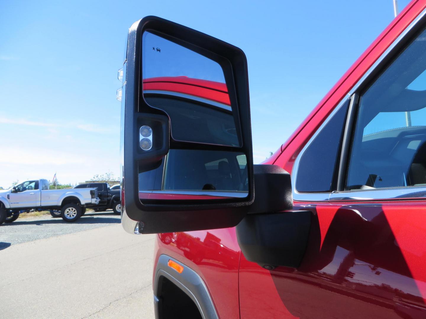 2024 Volcanic Red /Black GMC Sierra 2500HD Denali Crew Cab 4WD SB (1GT49REY6RF) with an 6.6L V8 OHV 16V TURBO DIESEL engine, 6A transmission, located at 2630 Grass Valley Highway, Auburn, CA, 95603, (530) 508-5100, 38.937893, -121.095482 - Denali 2500 featuring a Cognito Level kit, Fox shocks, 20" Fittipaldi FA18 wheels, 35" Nitto Ridge Grappler tires, and a LineX folding tonneau cover. - Photo#24
